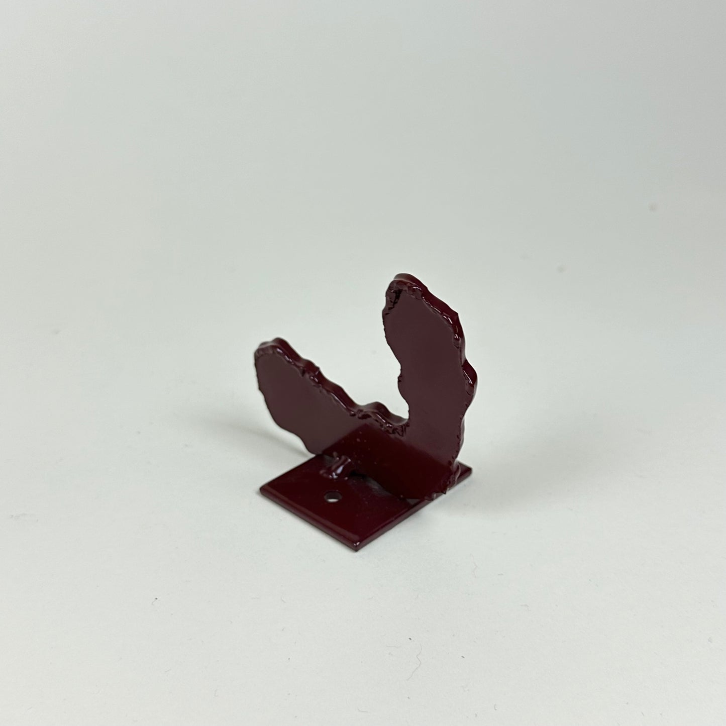 Burgundy metal wall hook by Lisa Reiser