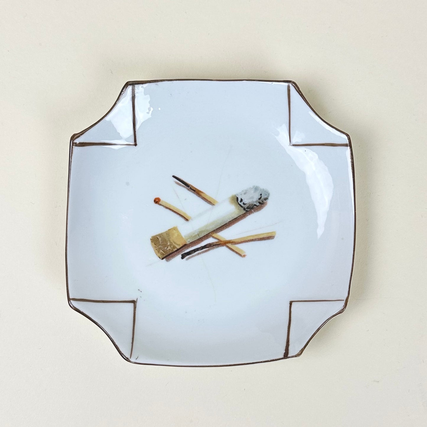 Ashtray with cigarette butt, vintage