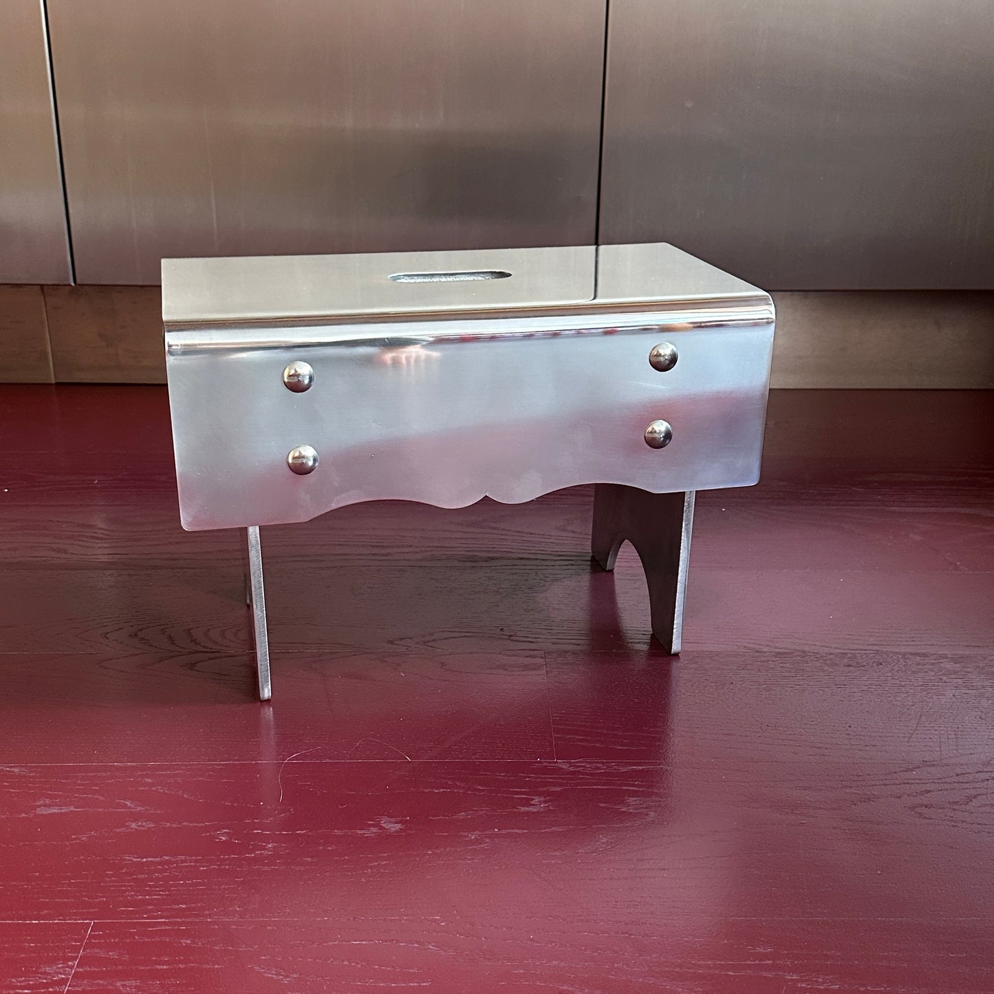 "Alumoge" milk stool in aluminum by Anna Levander