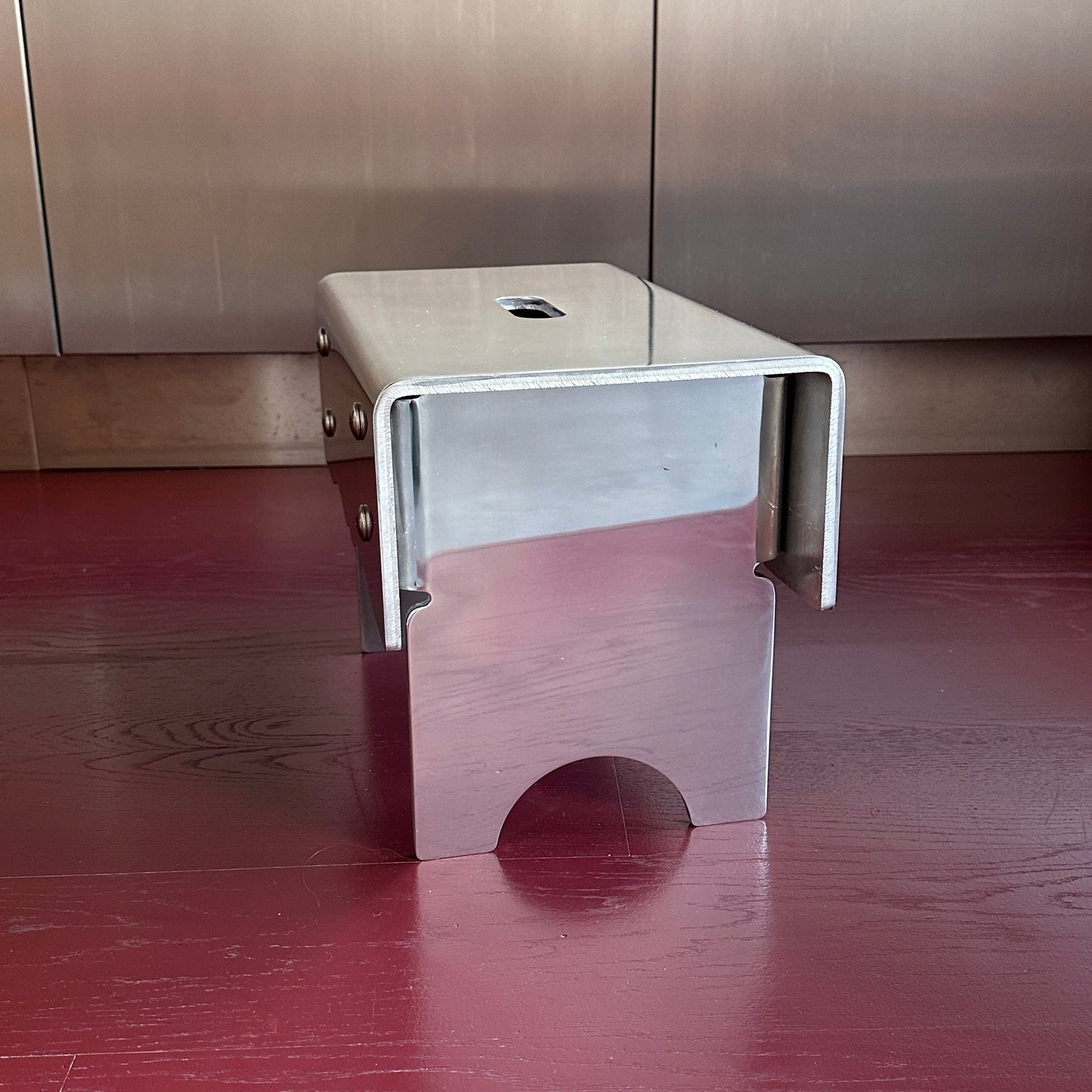 "Alumoge" milk stool in aluminum by Anna Levander