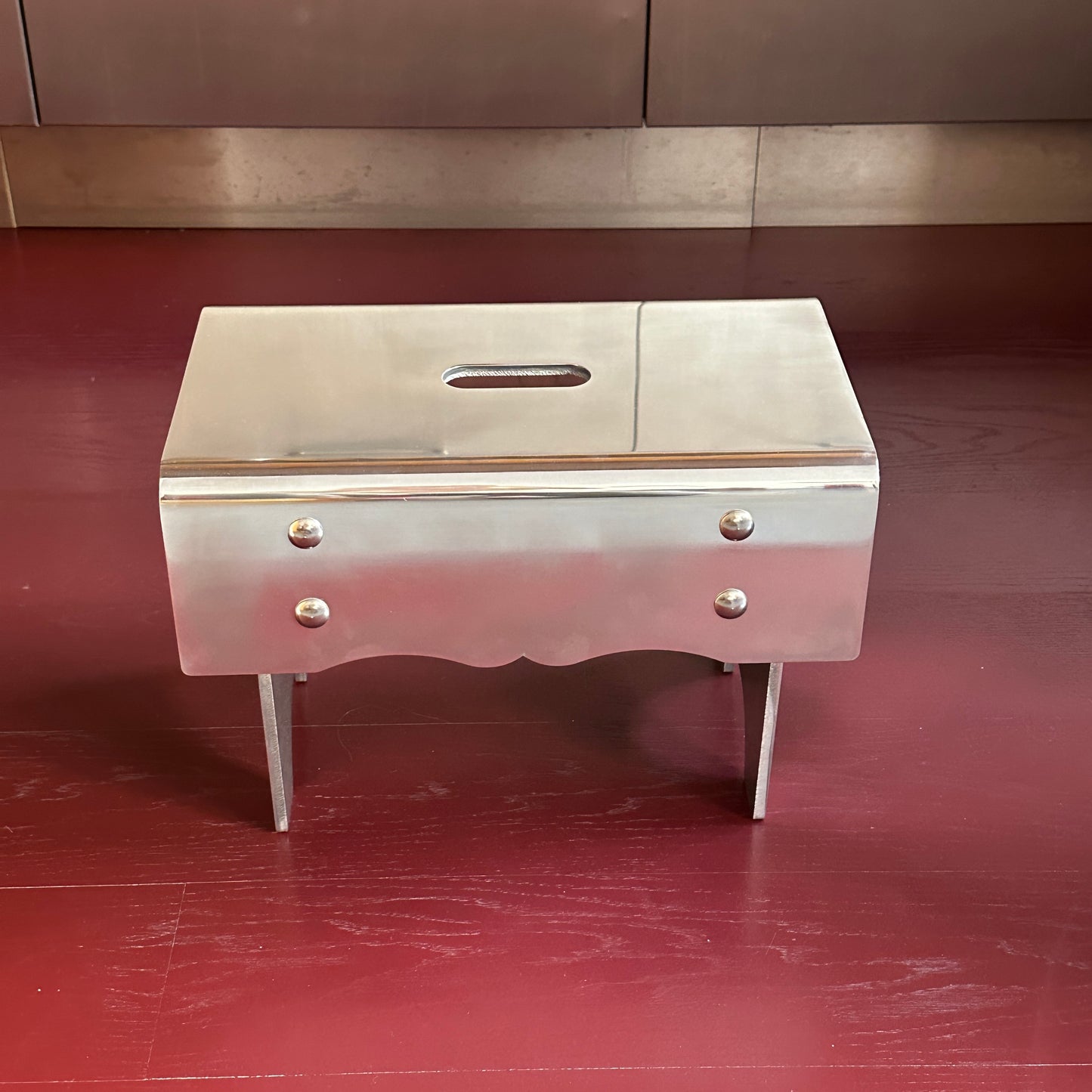 "Alumoge" milk stool in aluminum by Anna Levander