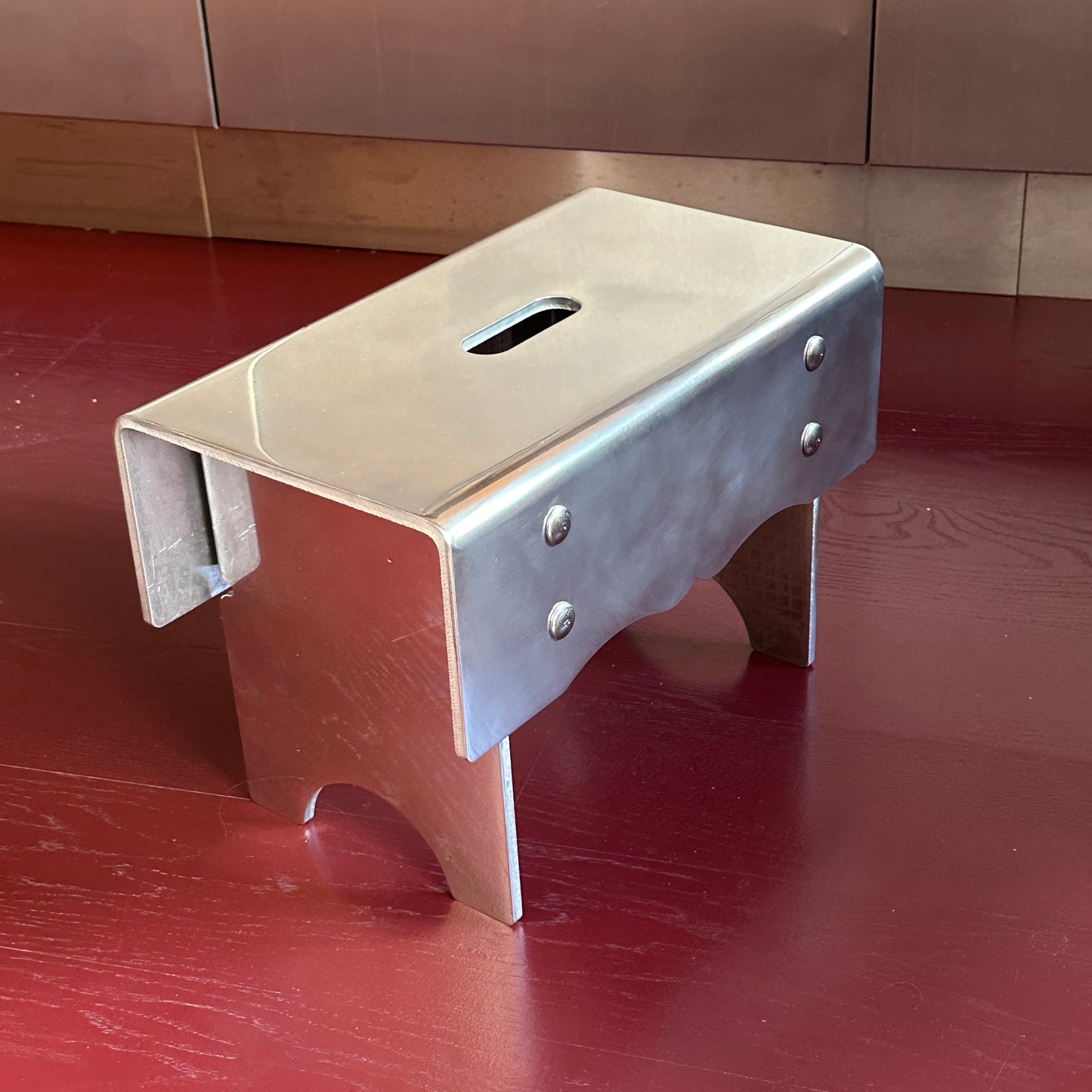 "Alumoge" milk stool in aluminum by Anna Levander