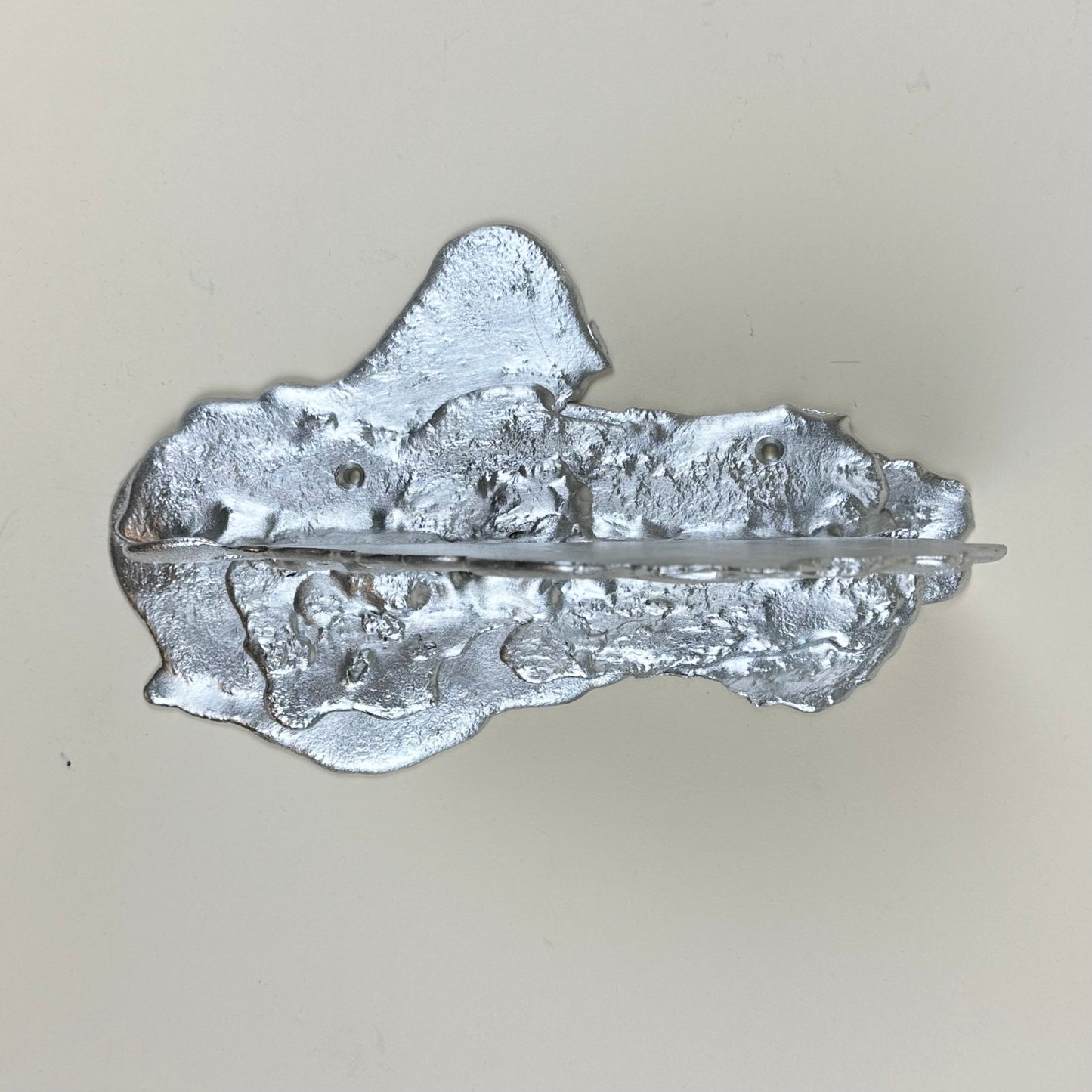 Tin shelf by Alfred Sahlén