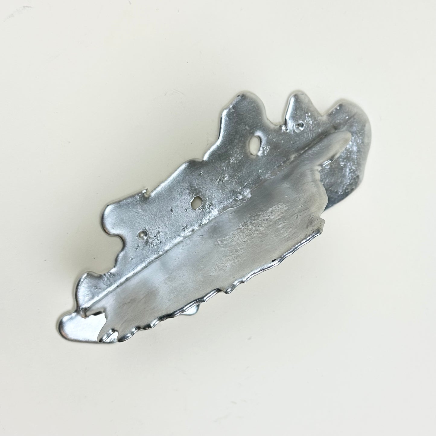 Tin shelf by Alfred Sahlén