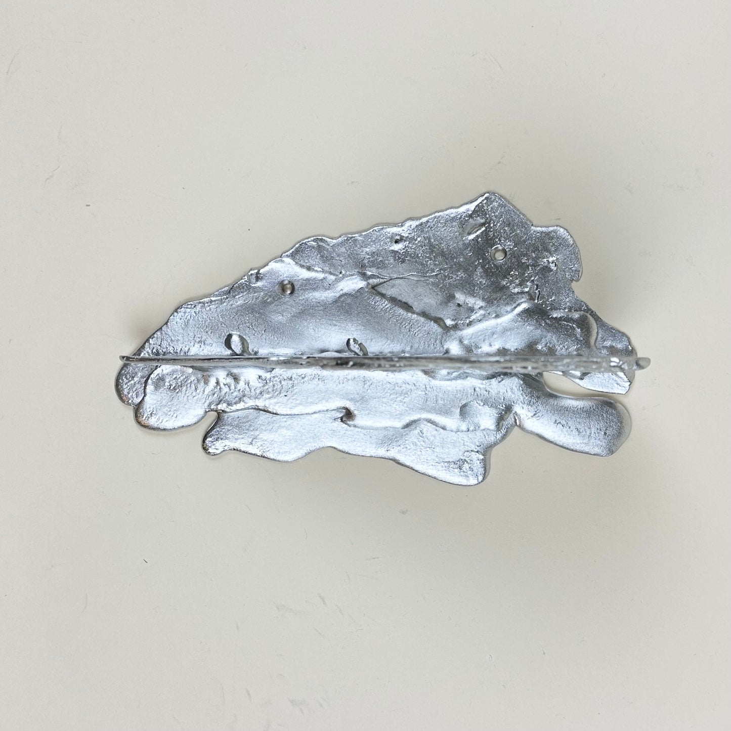 Tin shelf by Alfred Sahlén