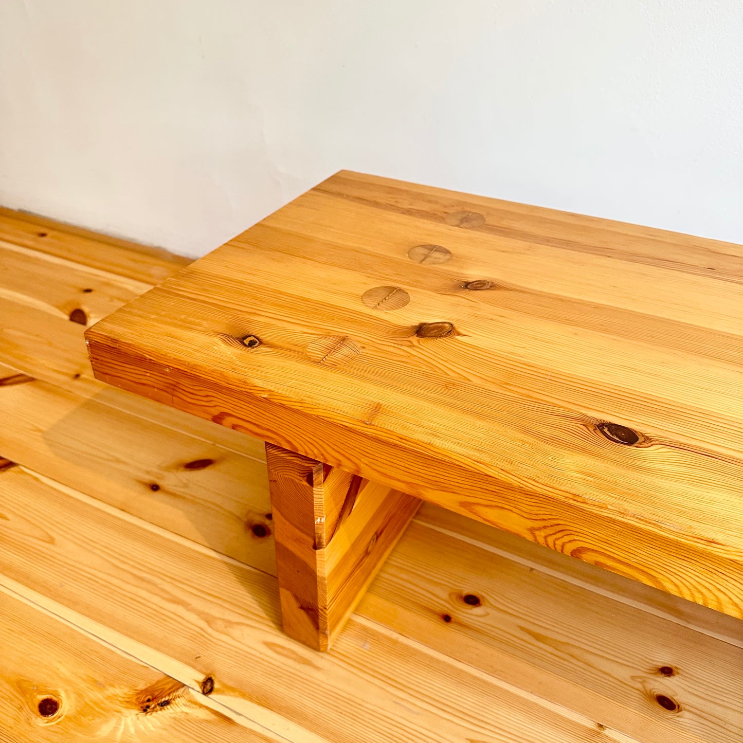 Wooden bench / coffee table by Roland WIlhelmsson