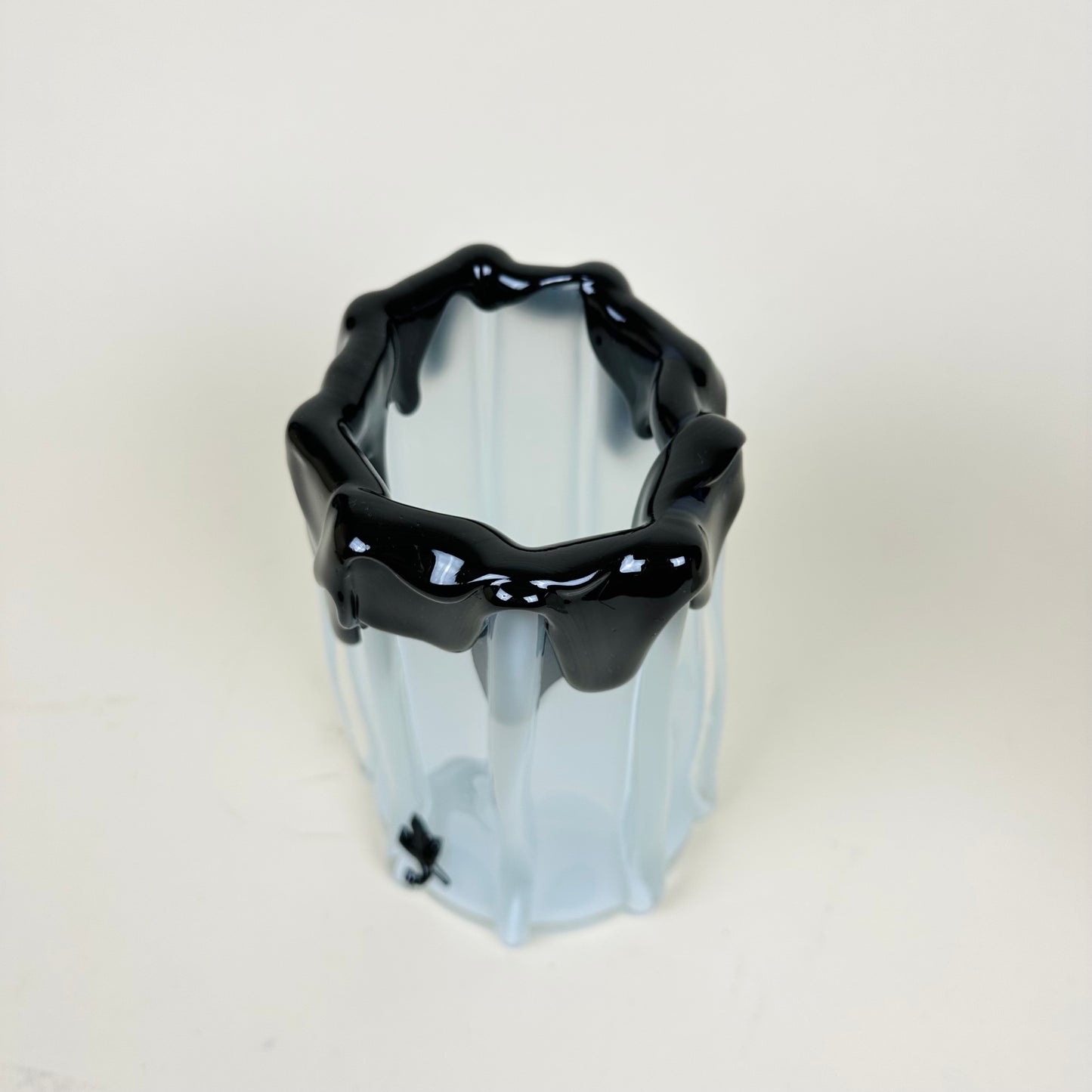 White and black glass vase by Silje Lindrup
