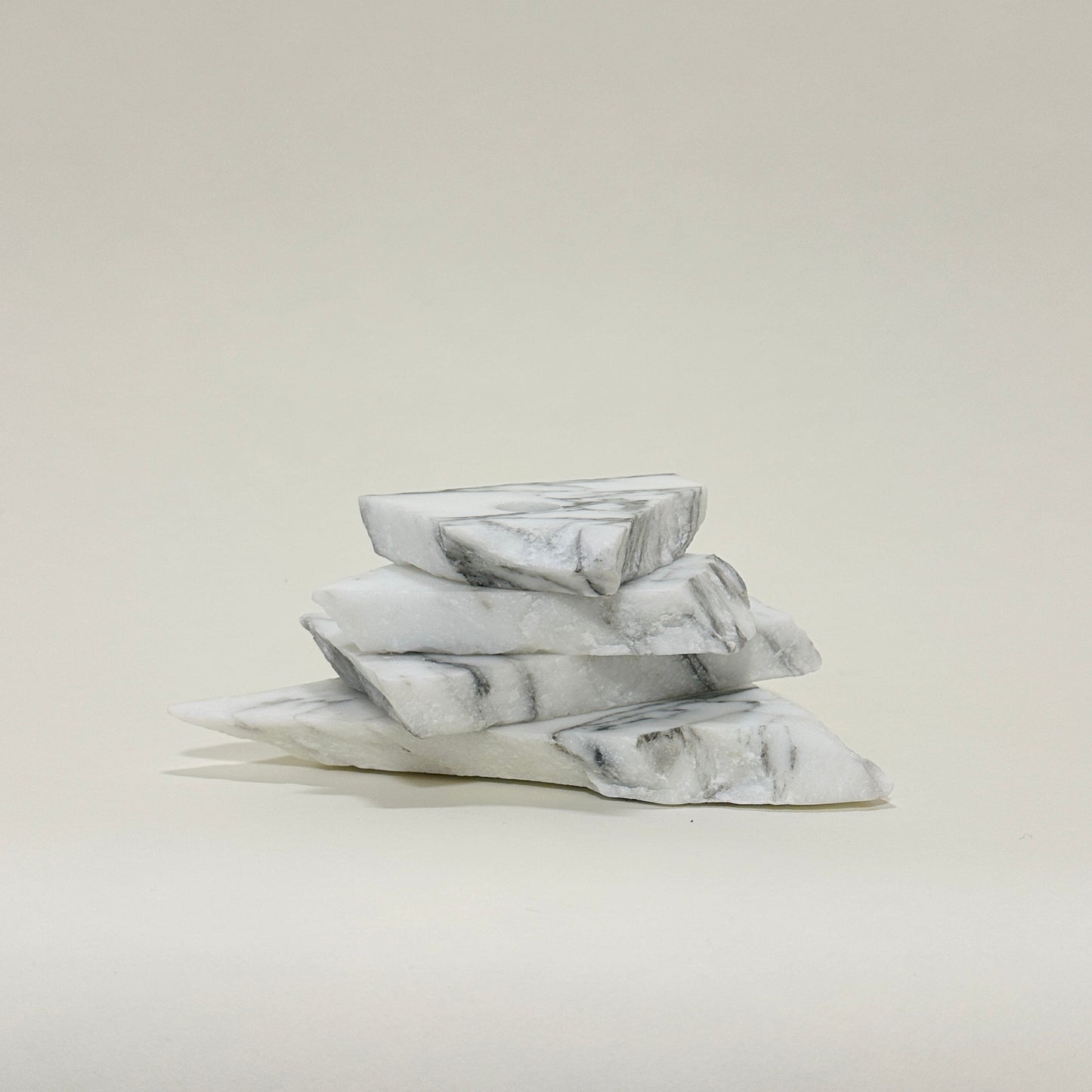 Candle holder in marble by Public Studio