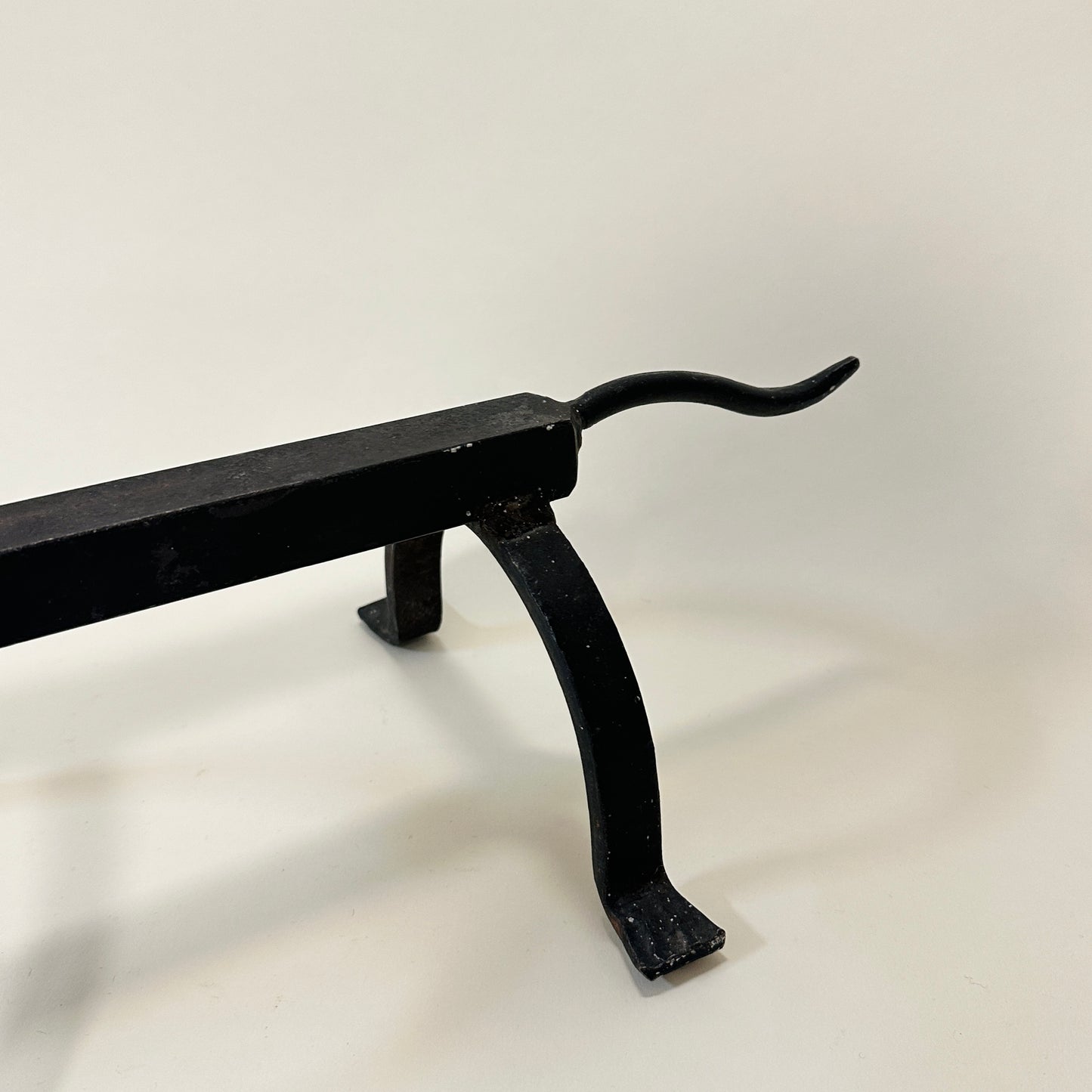 Andiron/firedog in wrought-iron, vintage