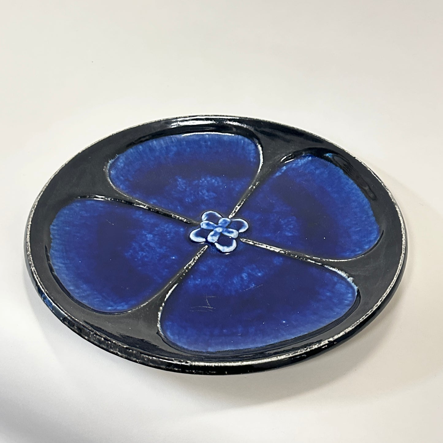Large black and blue ceramic plate, vintage