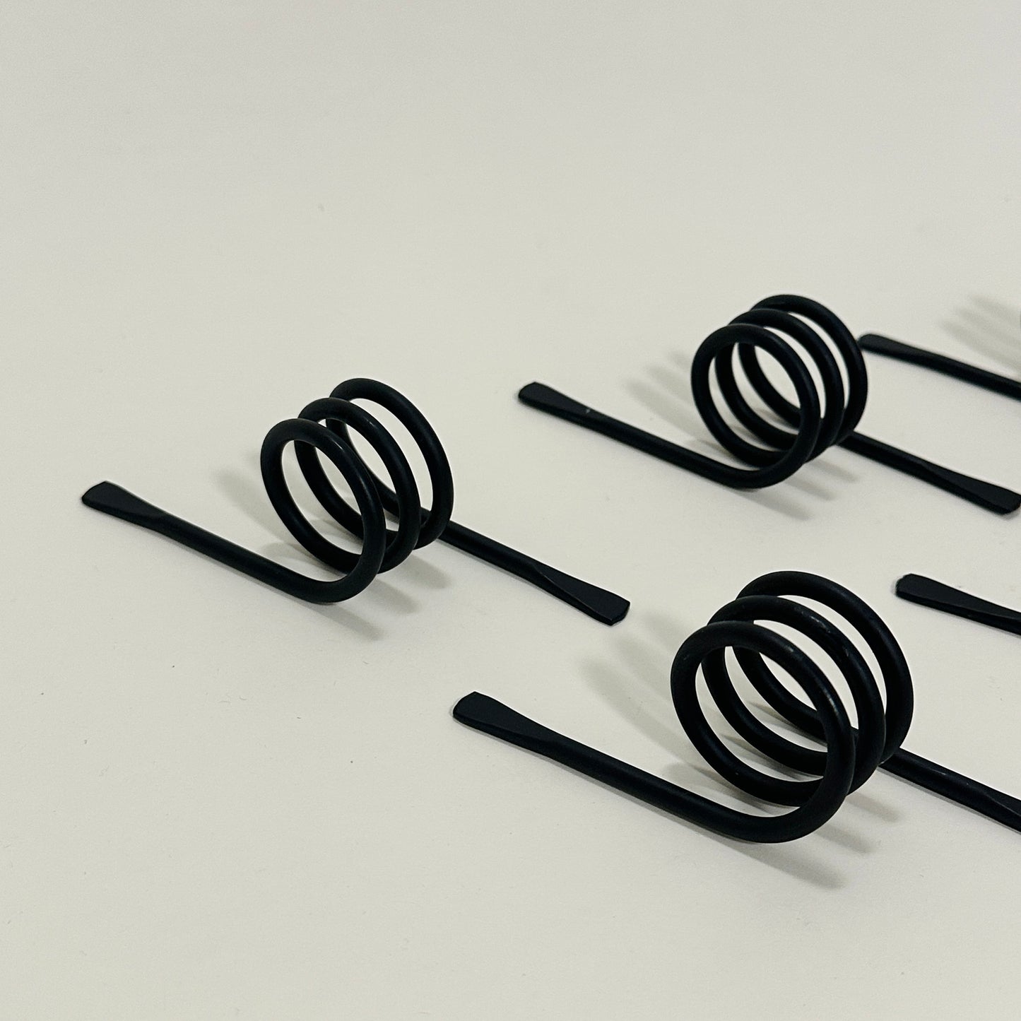 Six metal napkin rings, vintage