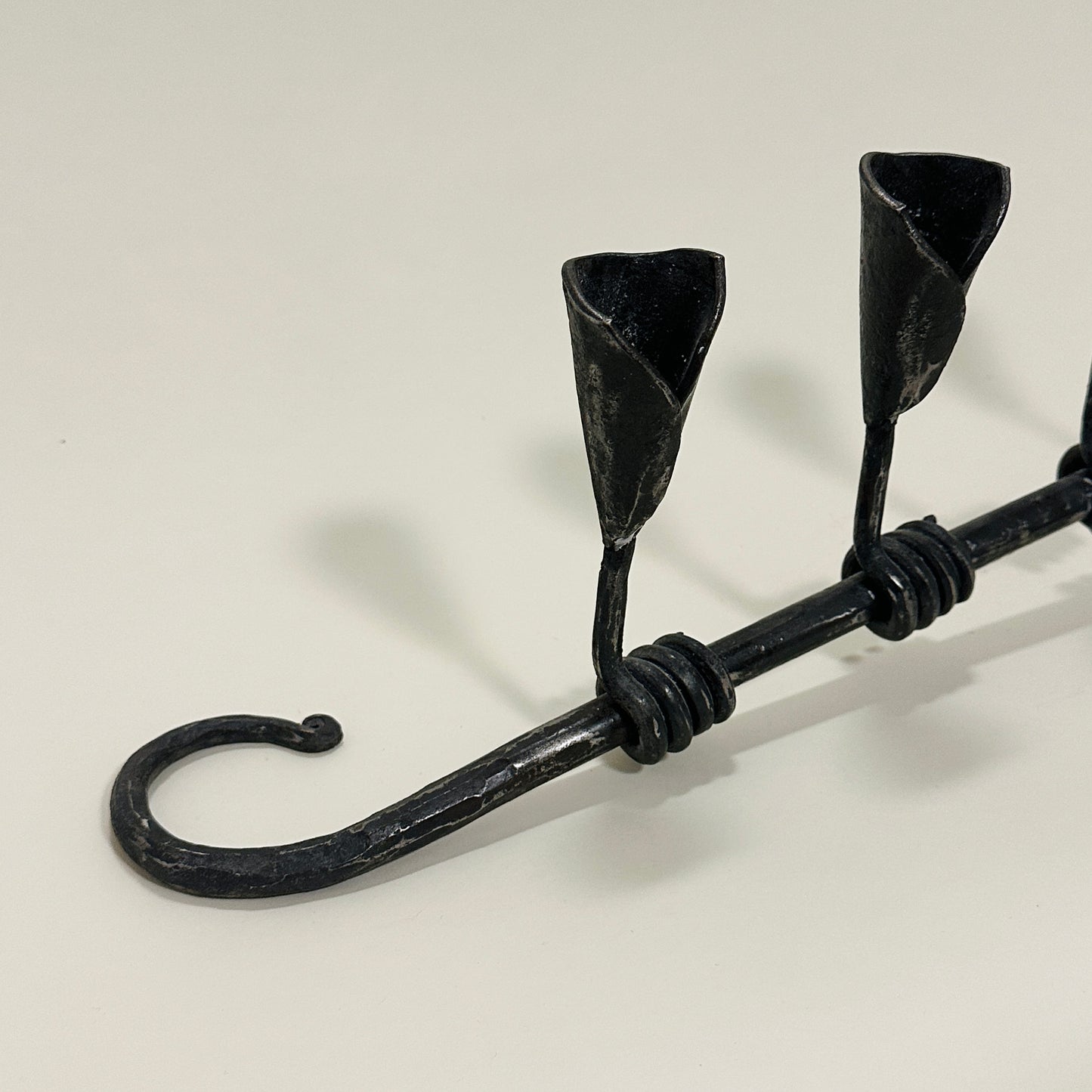 Rustic cast-iron candelabra, vintage