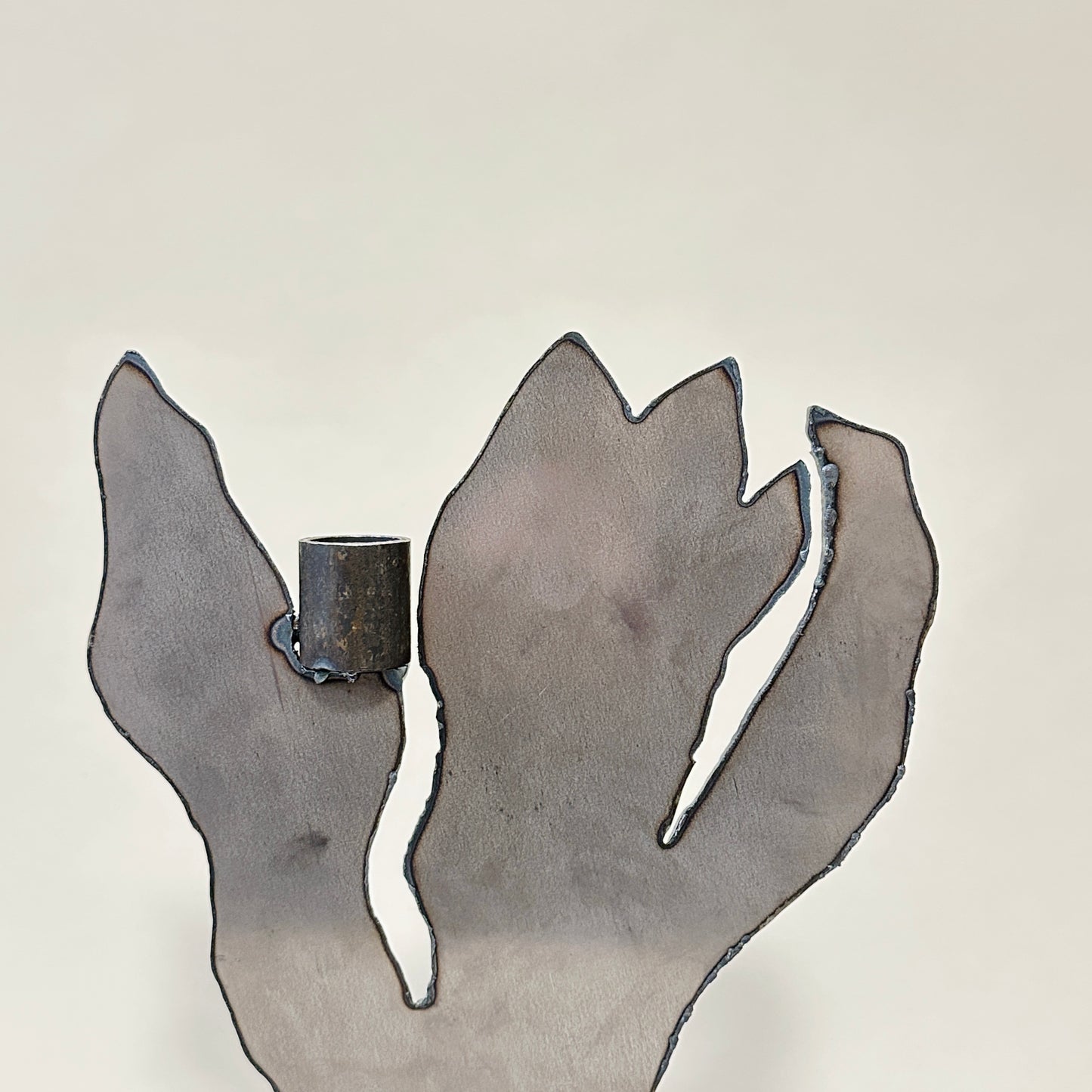 Metal candle holder by Lisa Reiser