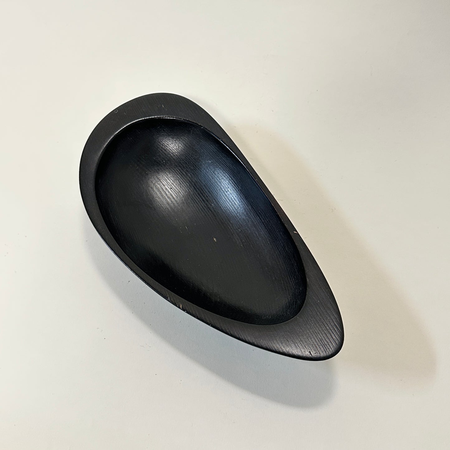 Black stained wooden bowl