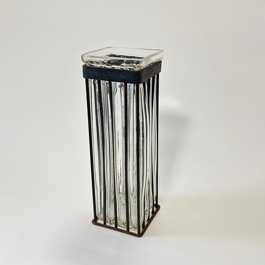 Vintage glass vase with metal cast