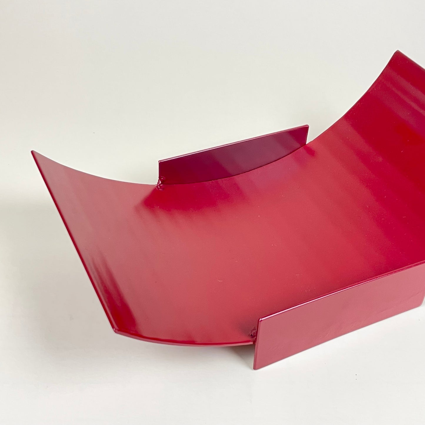 Metal fruit bowl by Lisa Reiser