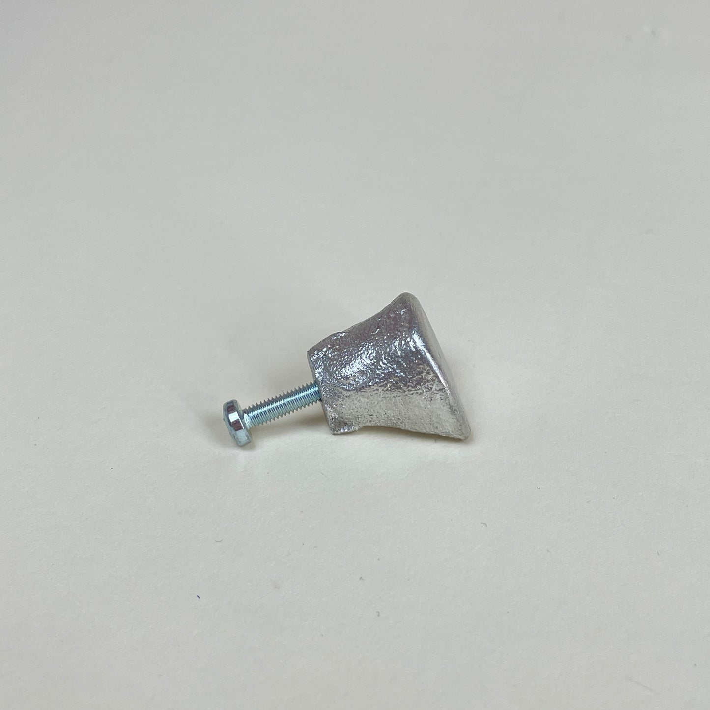 Tin door knob by Alfred Sahlén