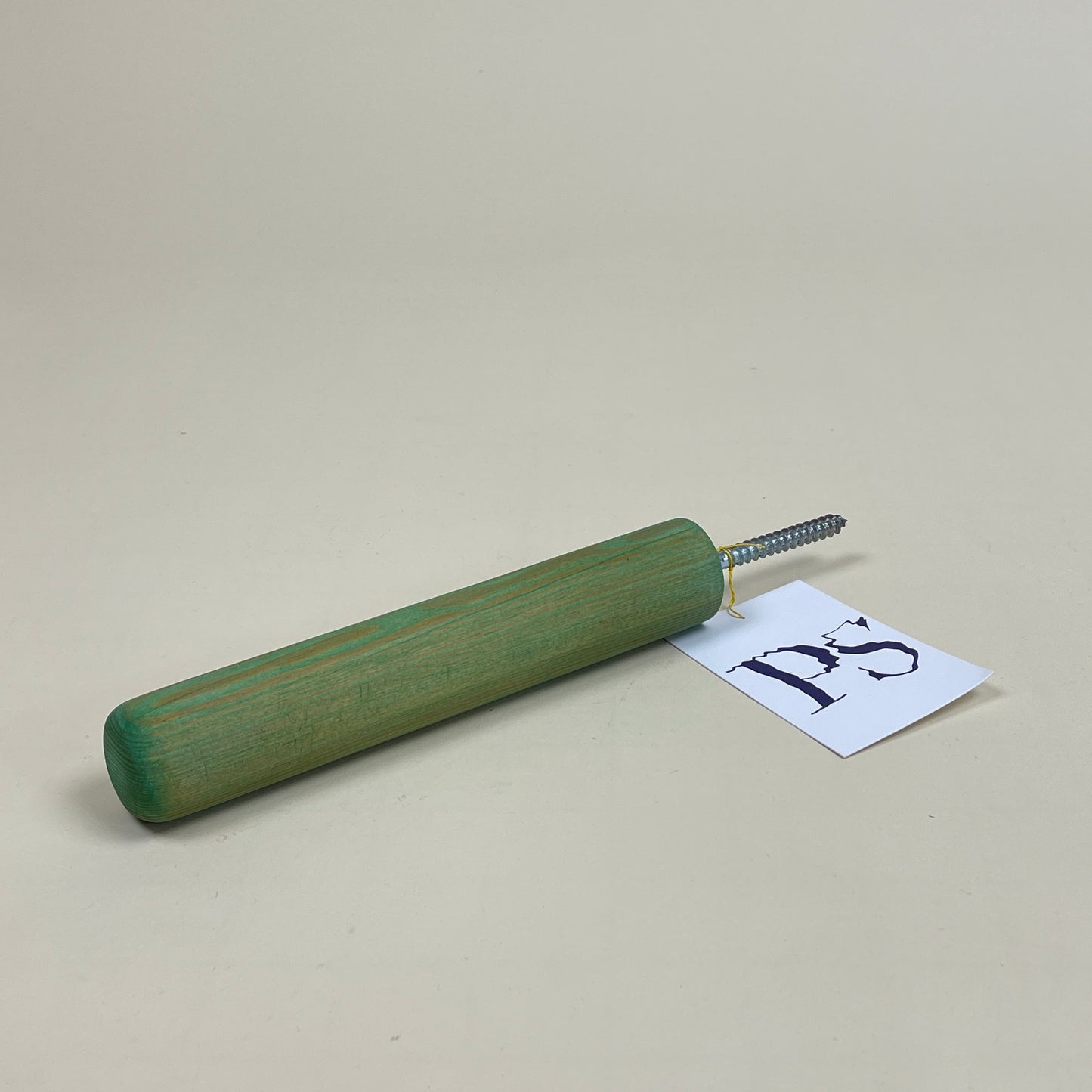 Light green wall hook by Public Studio