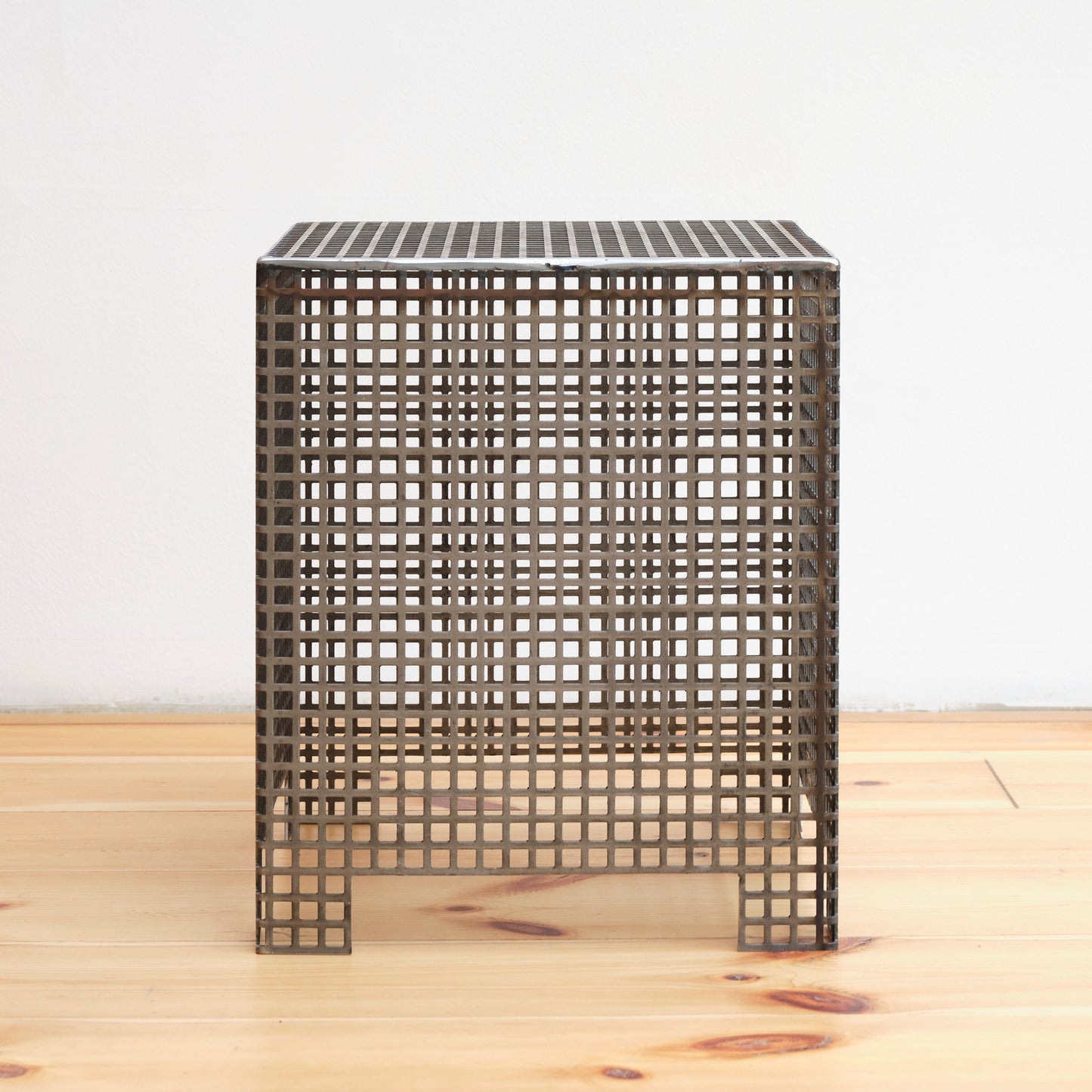 Steel grid pedestal, low, by Lisa Reiser