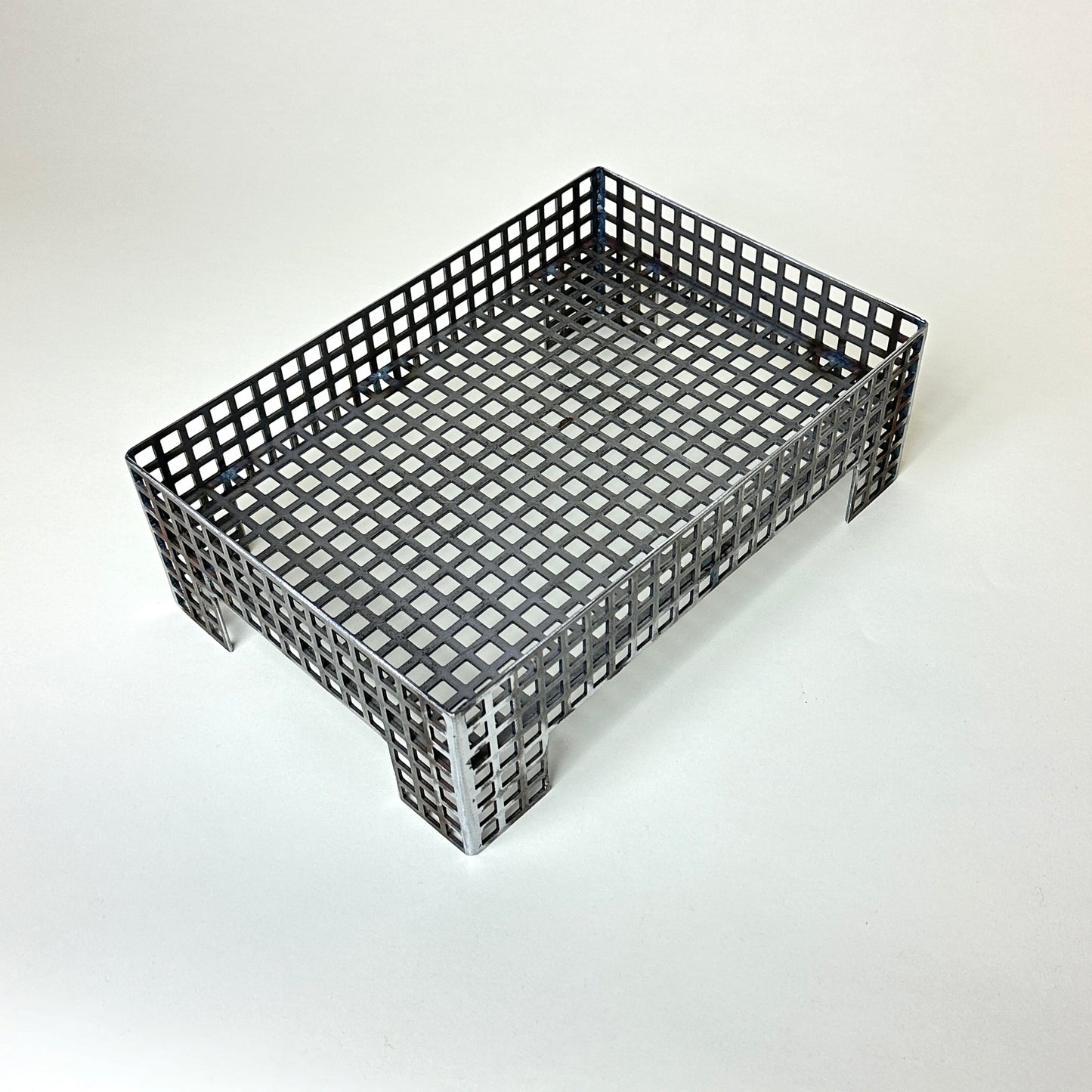 Steel grid letter holder by Lisa Reiser
