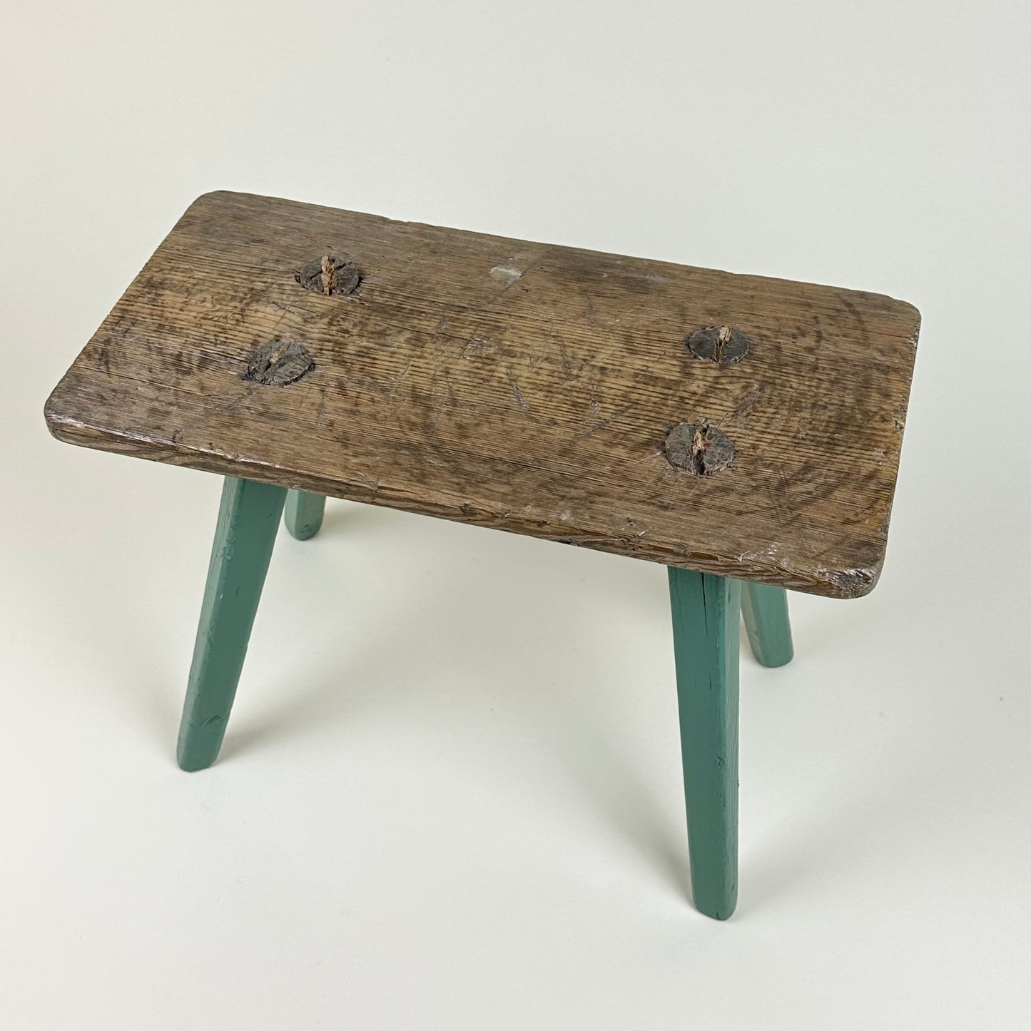 Low wooden stool, green legs, vintage