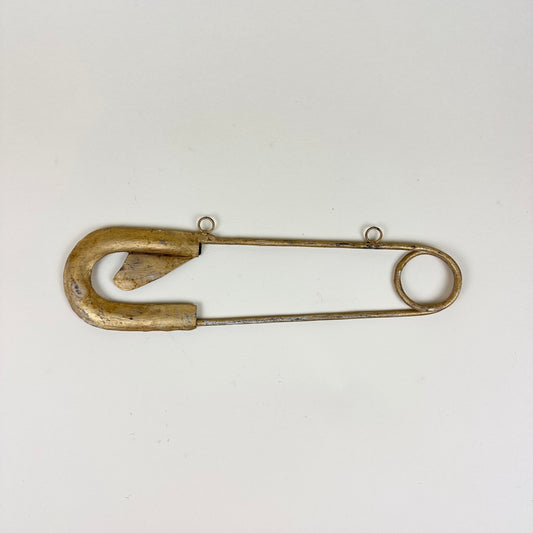 Metal safety pin sign/wall decoration, vintage