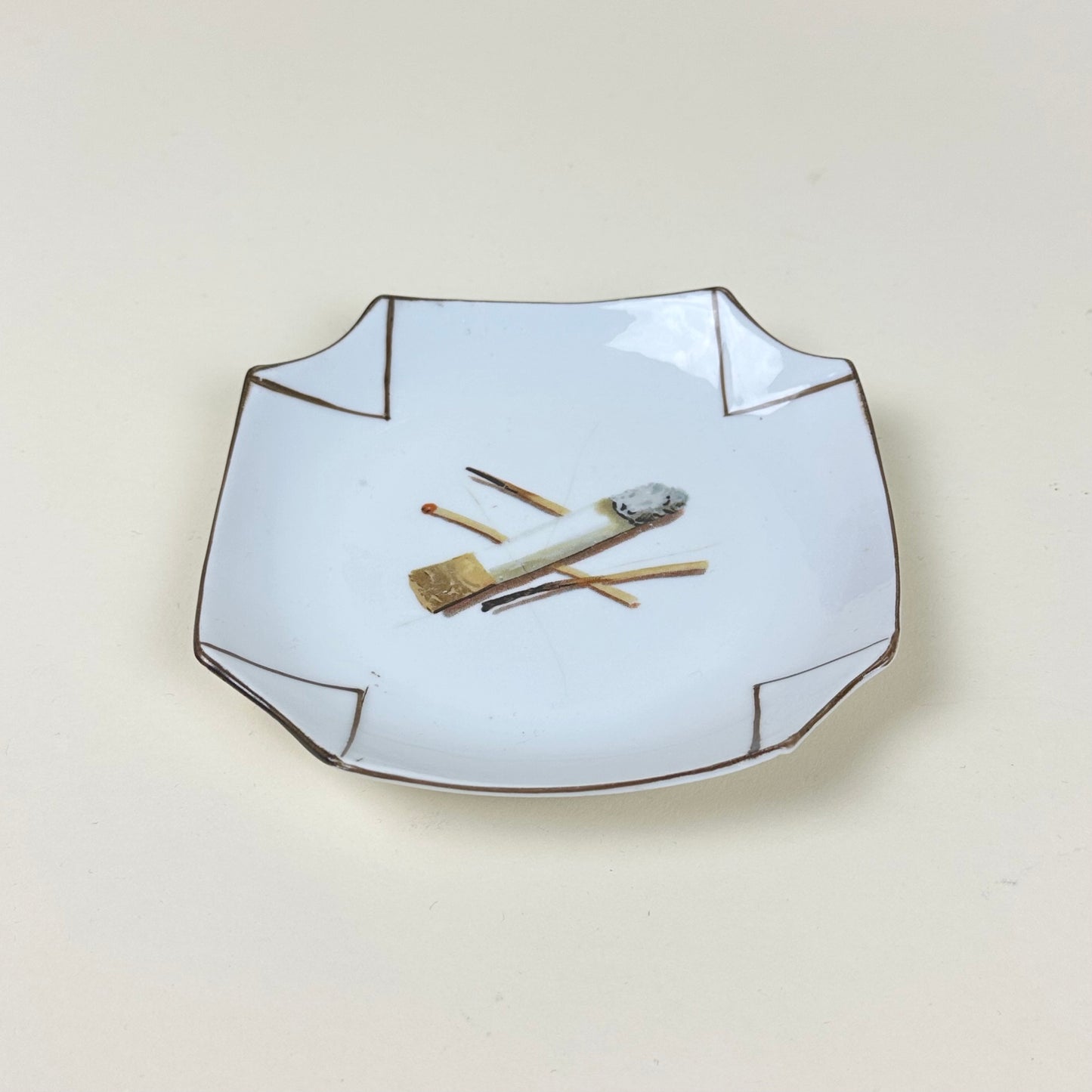 Ashtray with cigarette butt, vintage