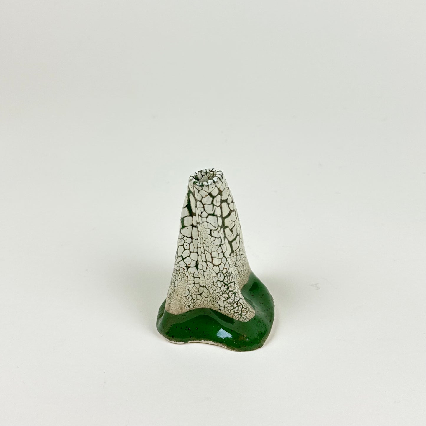 Green and white volcano vase (S) by Astrid Öhman.