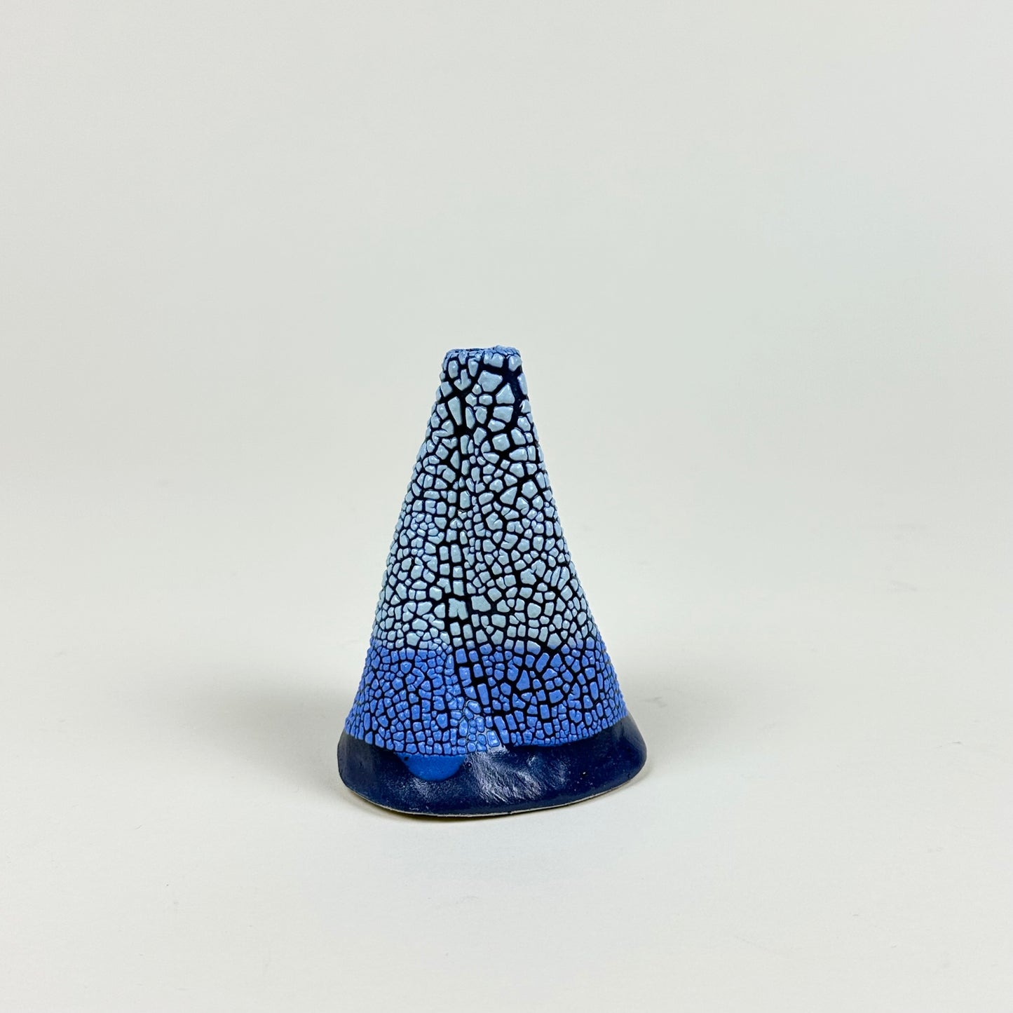 Three shades of blue volcano vase (S) by Astrid Öhman.