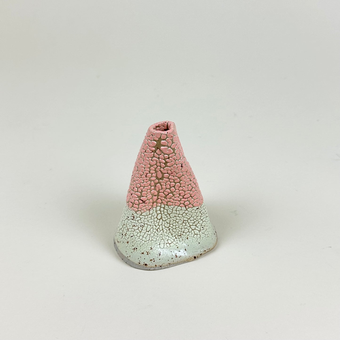 Pink and light yellow volcano vase (S) by Astrid Öhman.