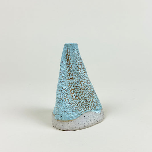 Light blue volcano vase (L) by Astrid Öhman.