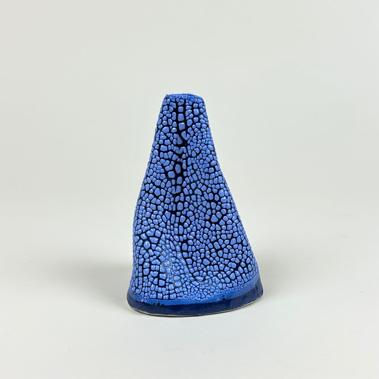 Blue volcano vase (L) by Astrid Öhman.