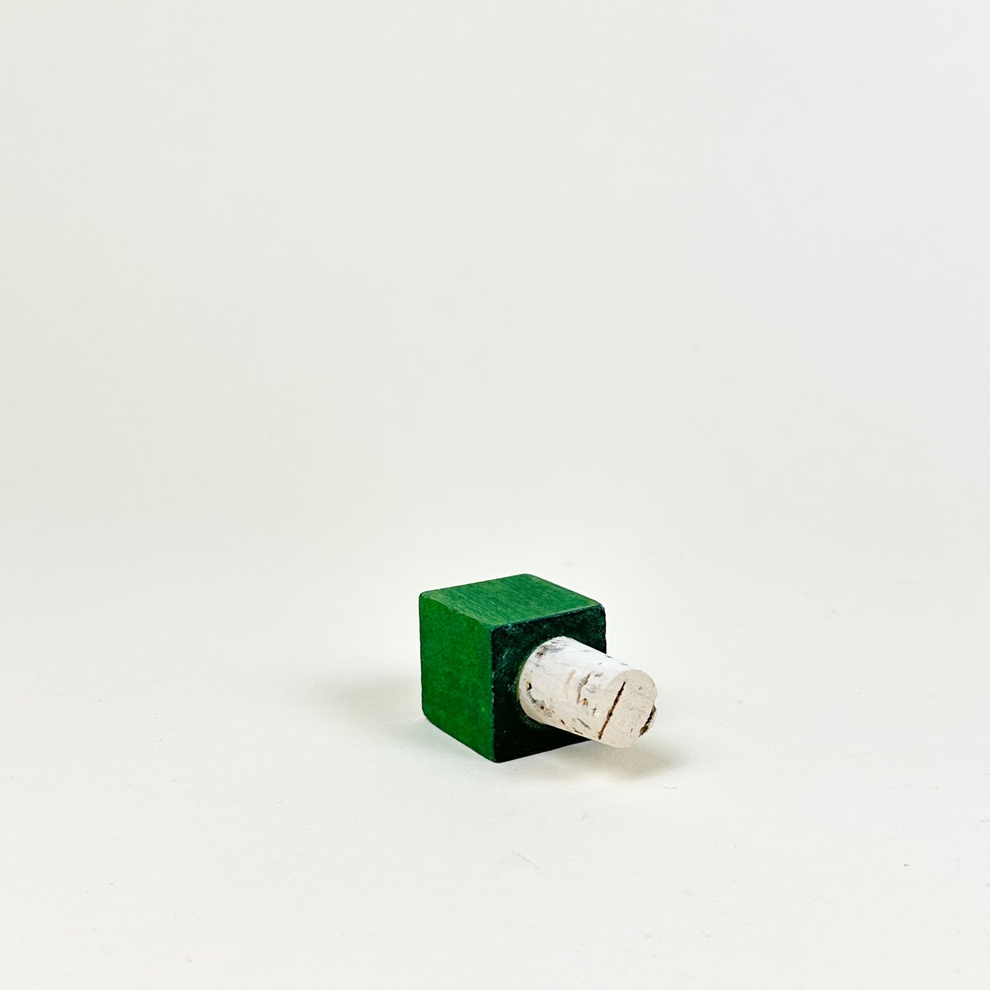 Bottle stopper, green cube by Hugo Sundkvist