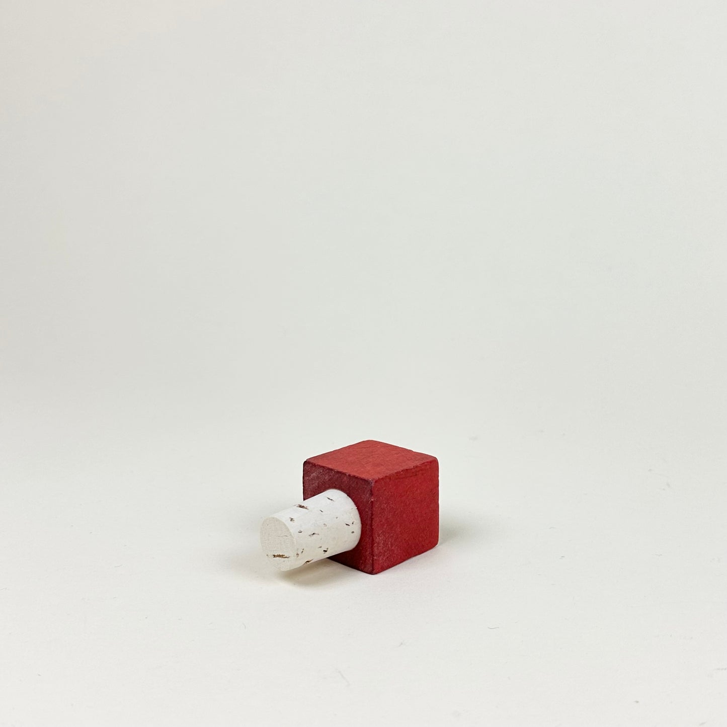 Bottle stopper, red cube, by Hugo Sundkvist
