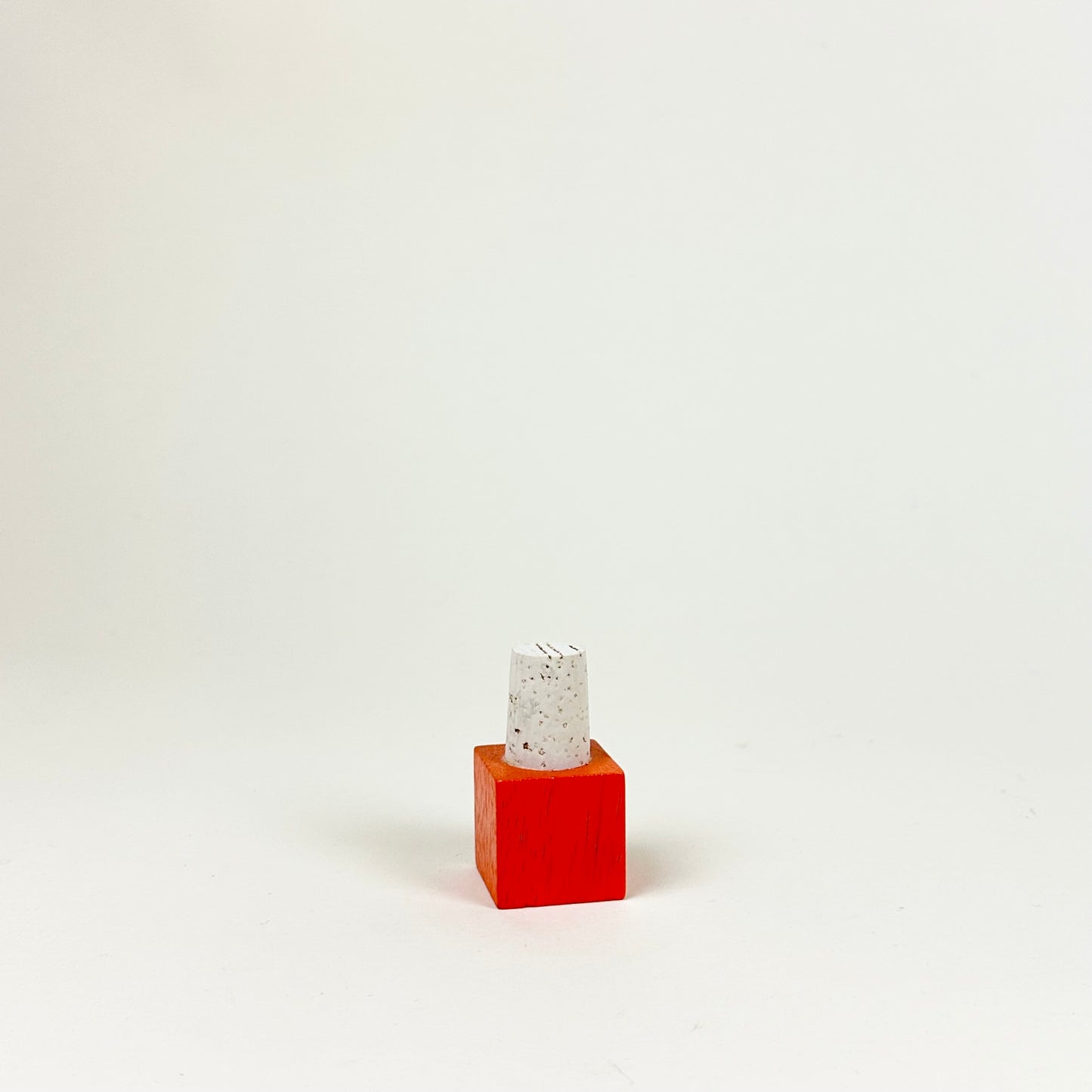 Bottle stopper, tomato red cube, by Hugo Sundkvist