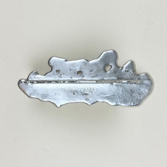 Tin shelf by Alfred Sahlén