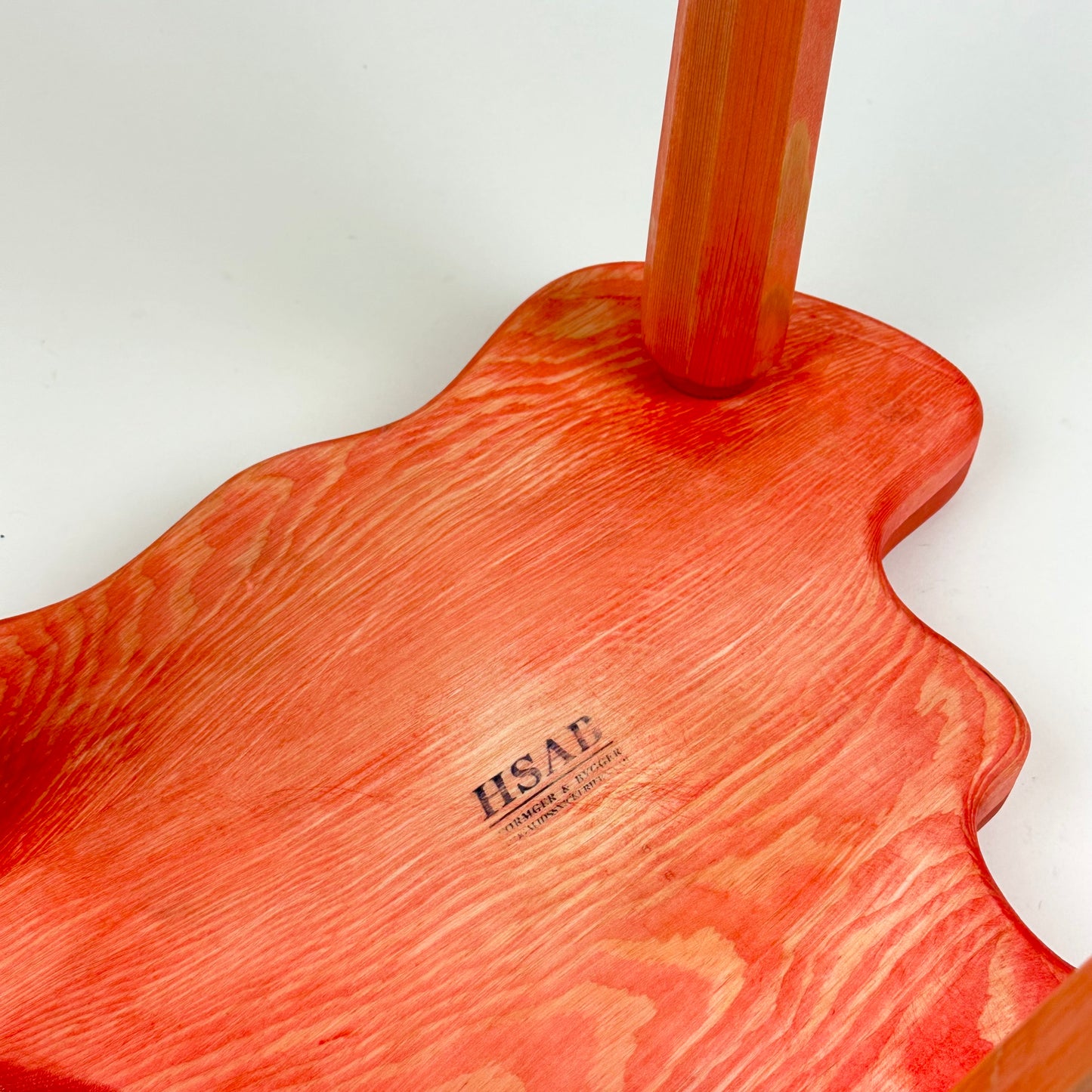 Red wooden stool by HSAB