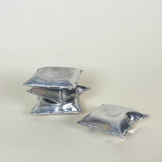 Aluminum pillow bowl by Emma Stocklassa