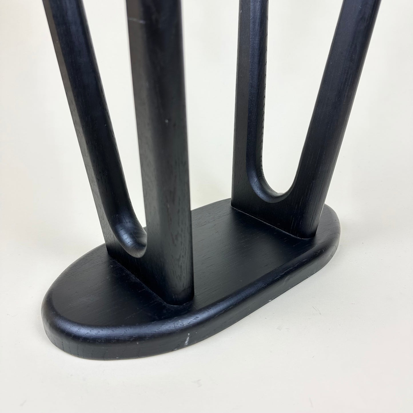 Small black 4 legged stool, vintage