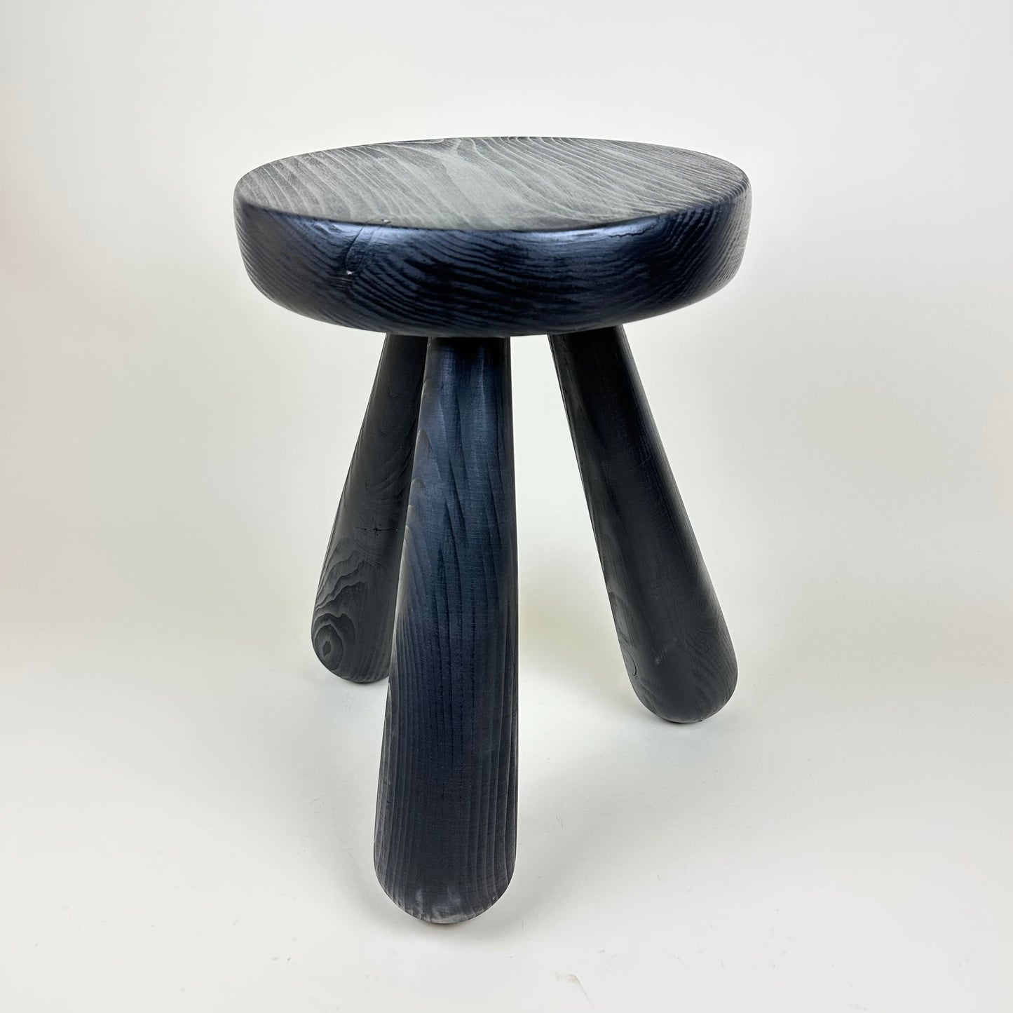 Wooden black stained pine stool