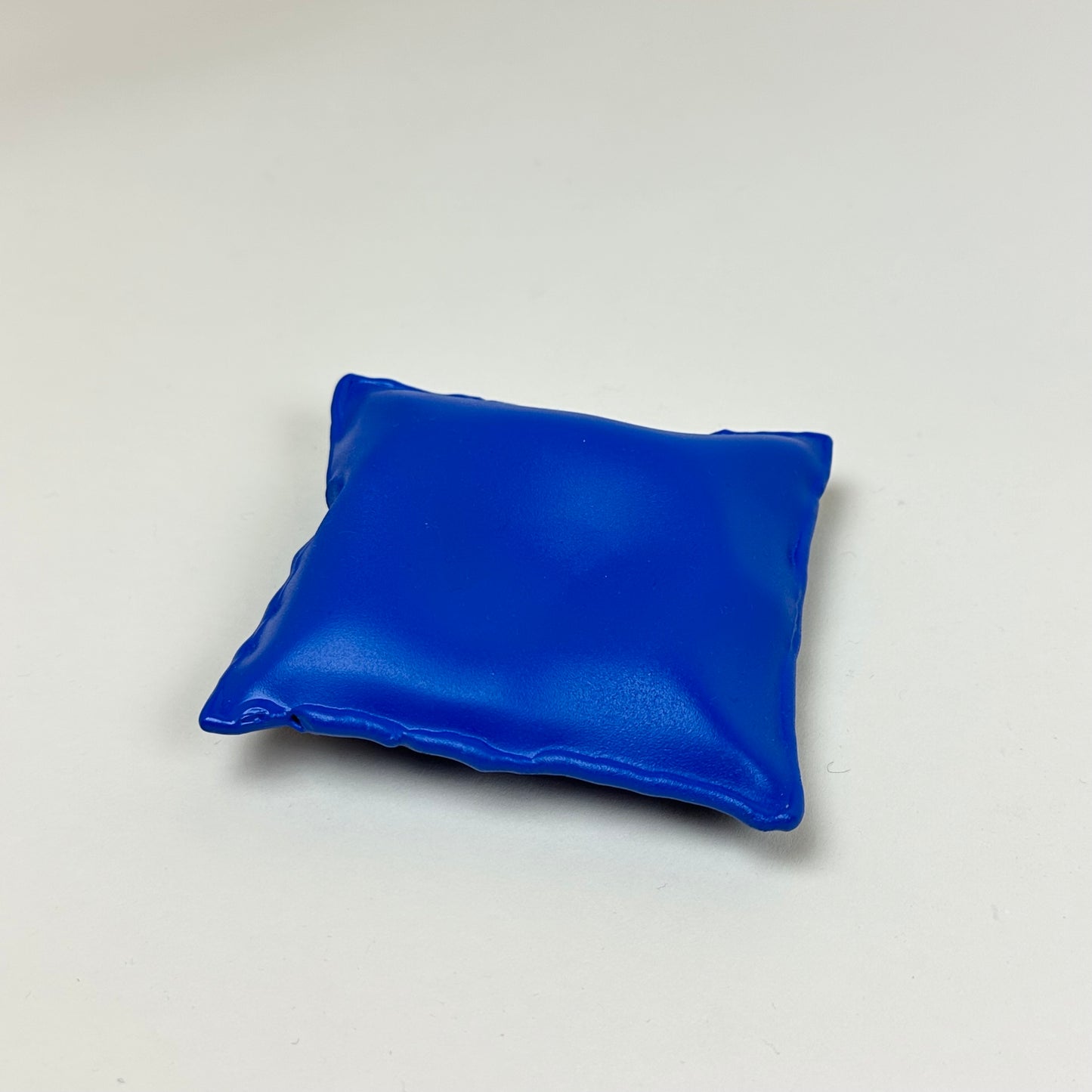 Blue aluminum pillow bowl by Emma Stocklassa