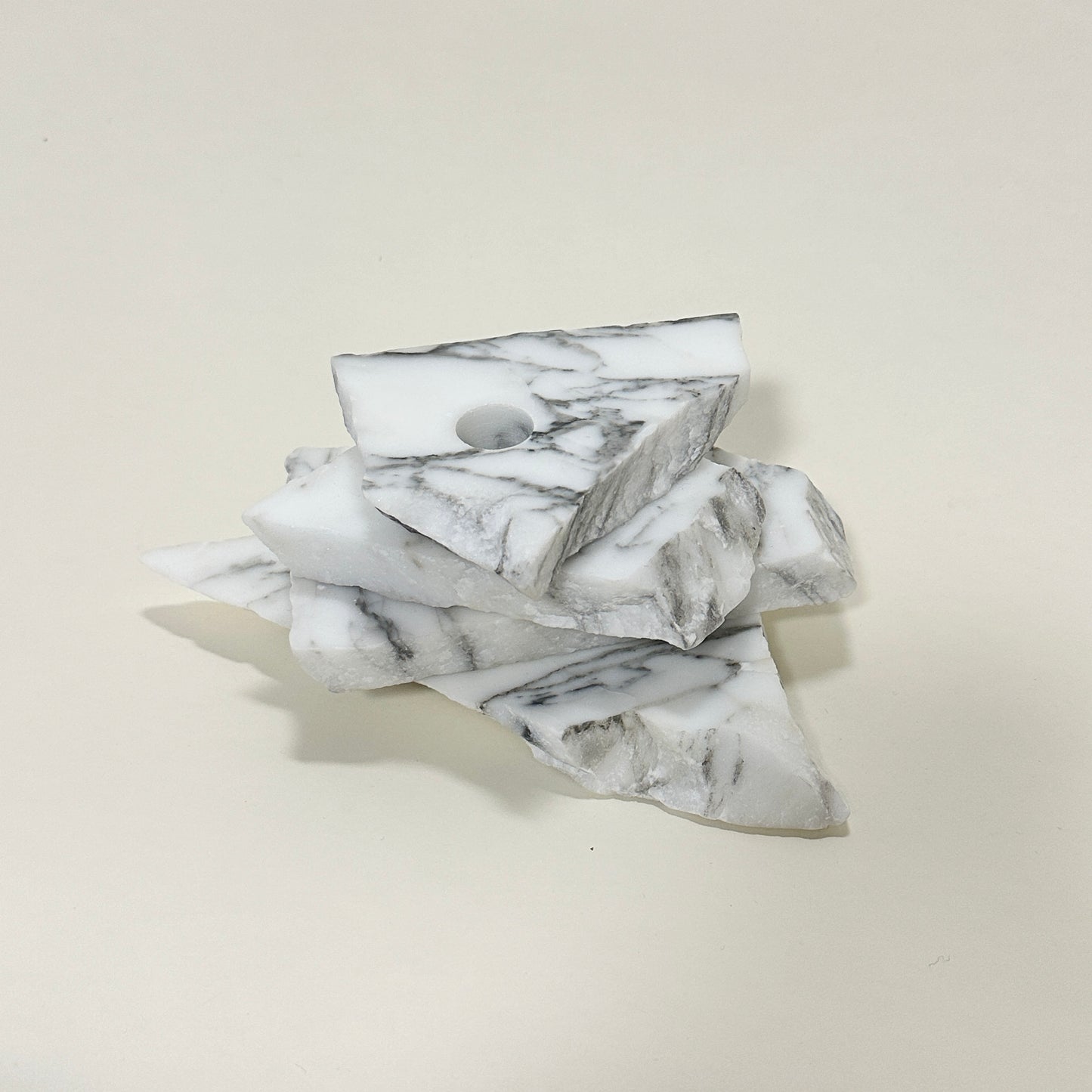 Candle holder in marble by Public Studio