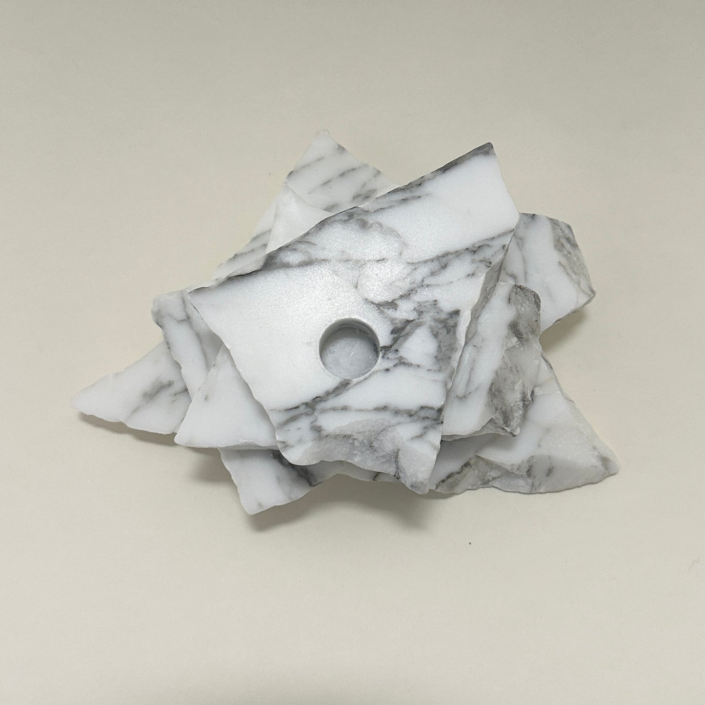 Candle holder in marble by Public Studio