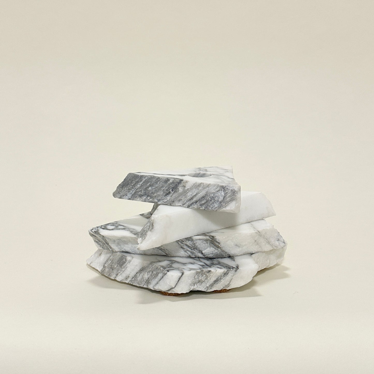 Candle holder in marble by Public Studio