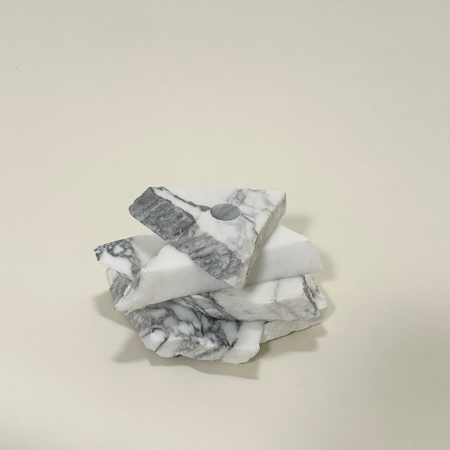 Candle holder in marble by Public Studio