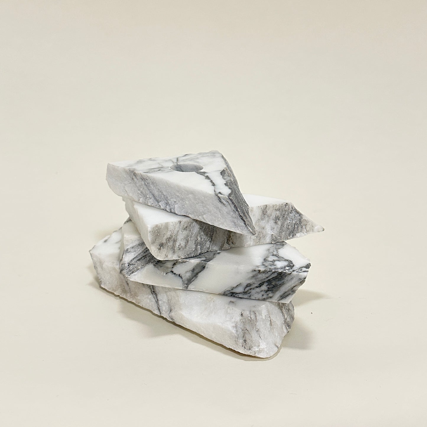 Candle holder in marble by Public Studio