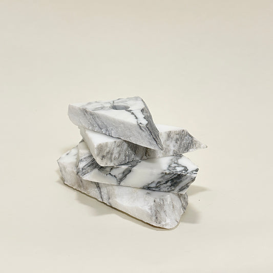 Candle holder in marble by Public Studio
