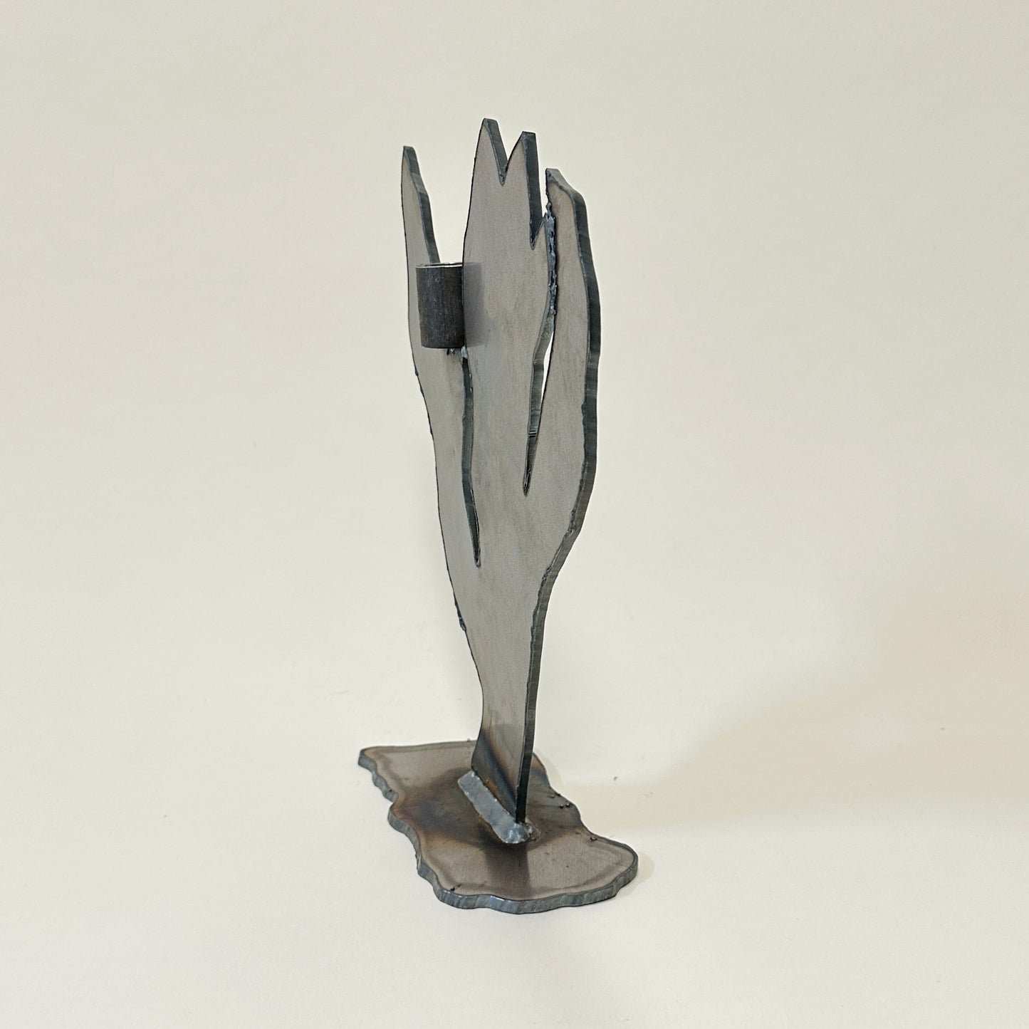 Metal candle holder by Lisa Reiser