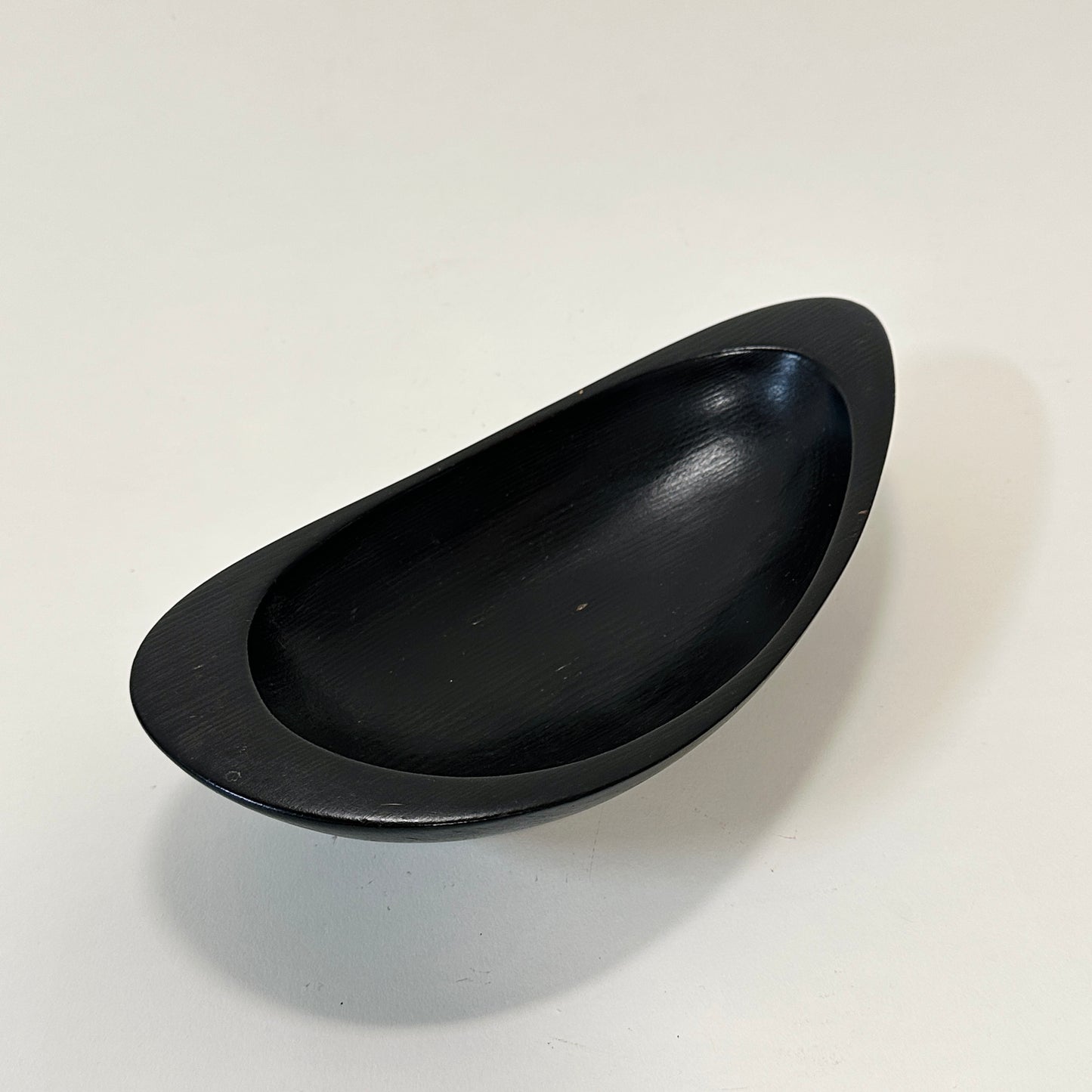 Black stained wooden bowl