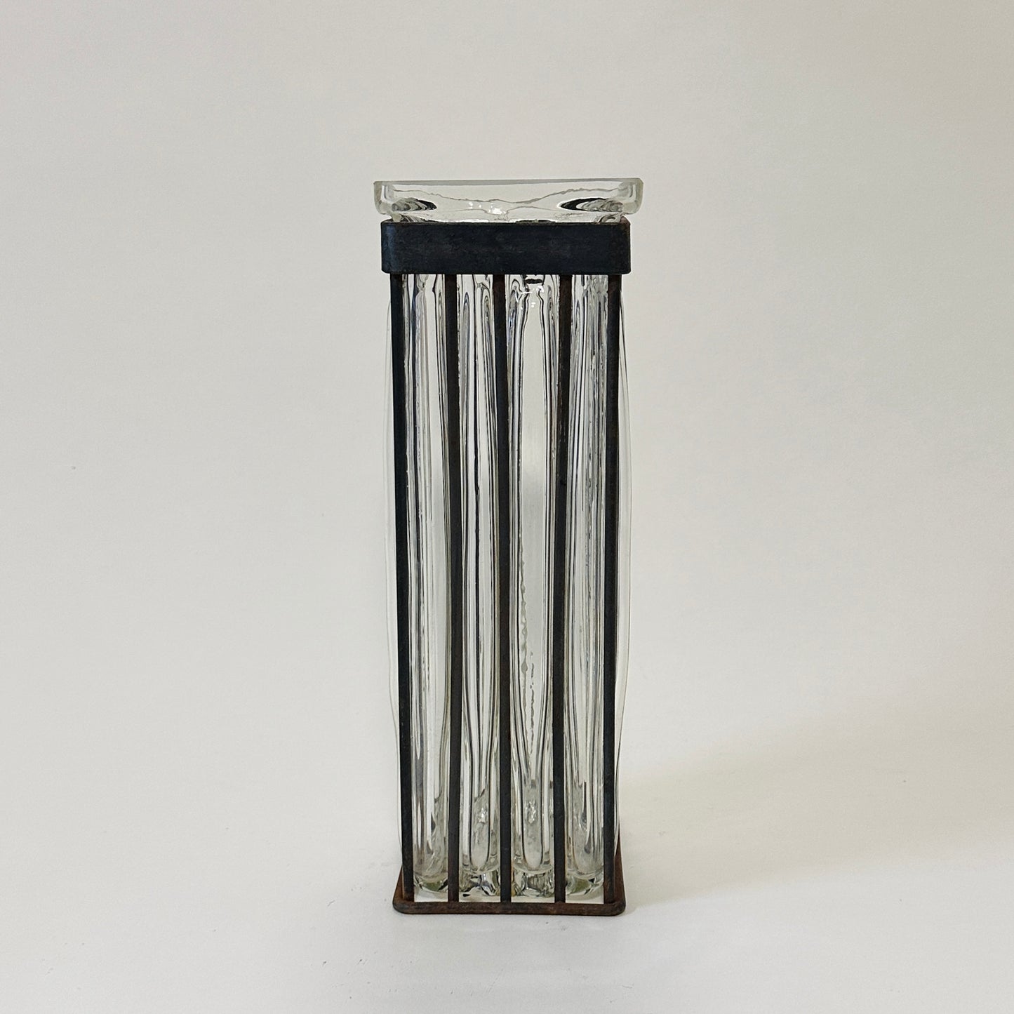 Vintage glass vase with metal cast